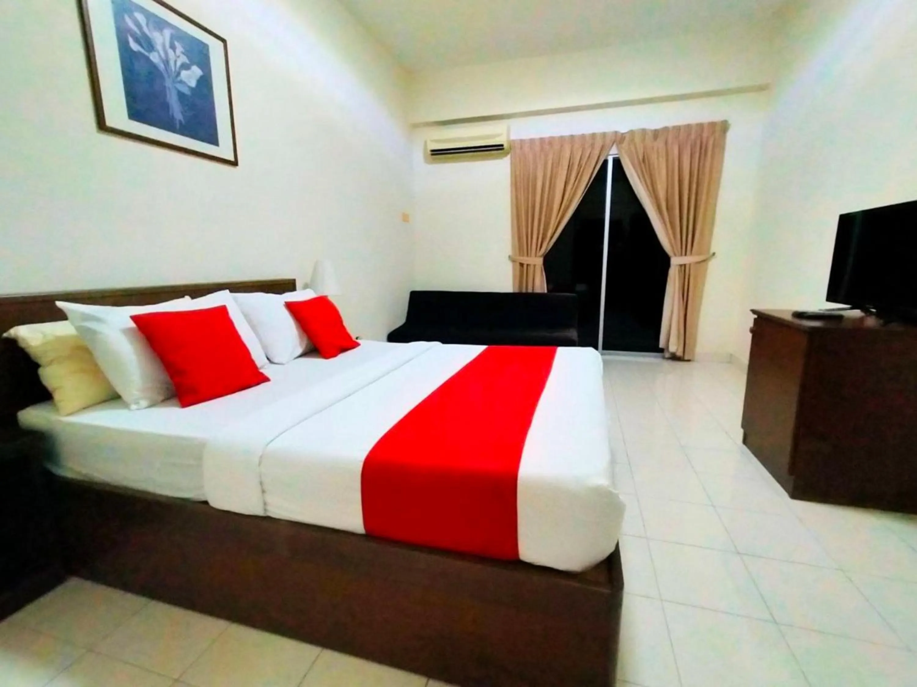 Bedroom in Capital O Suria Urban Escape