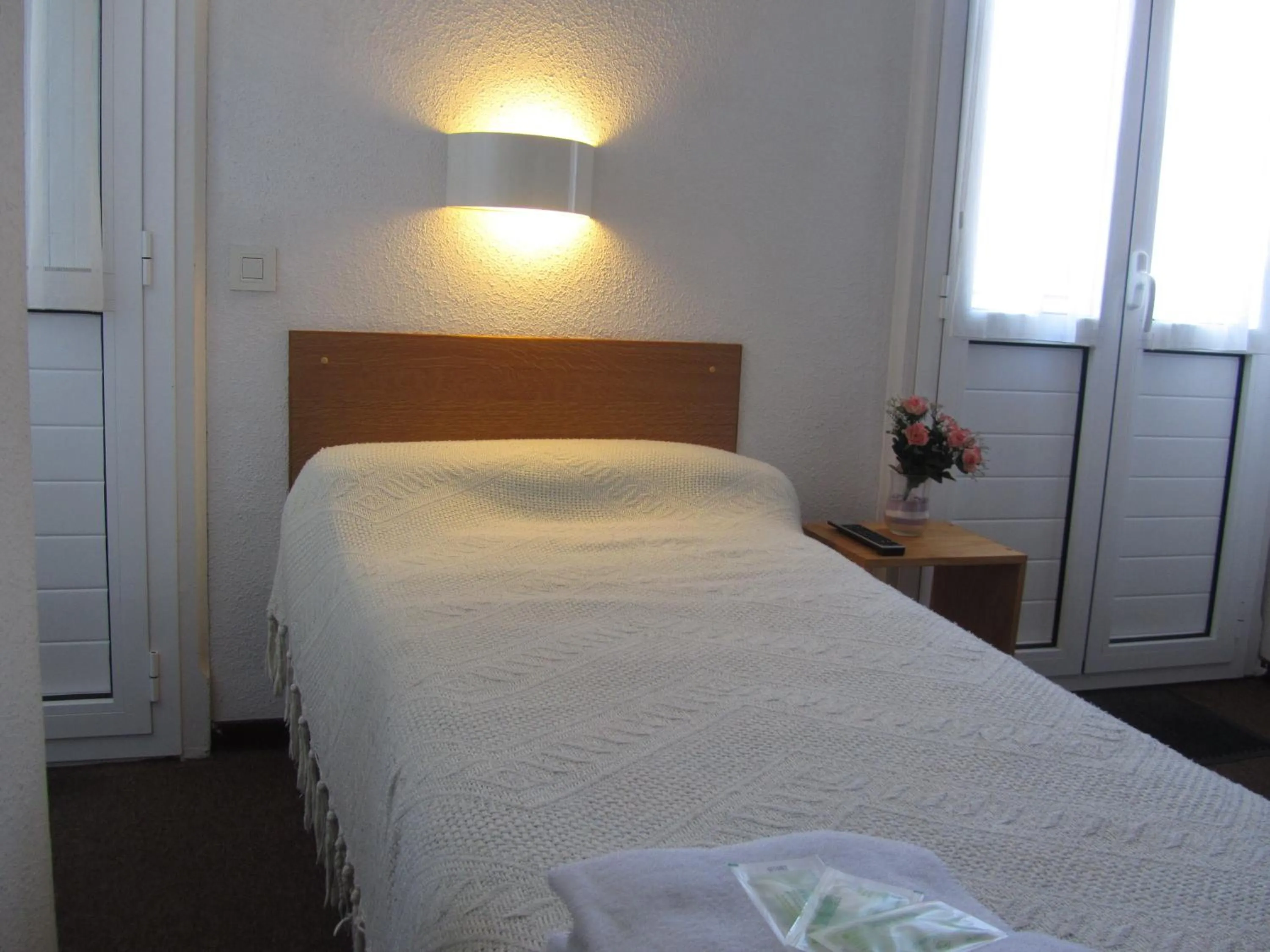 Bed in Hôtel Duchesse Anne