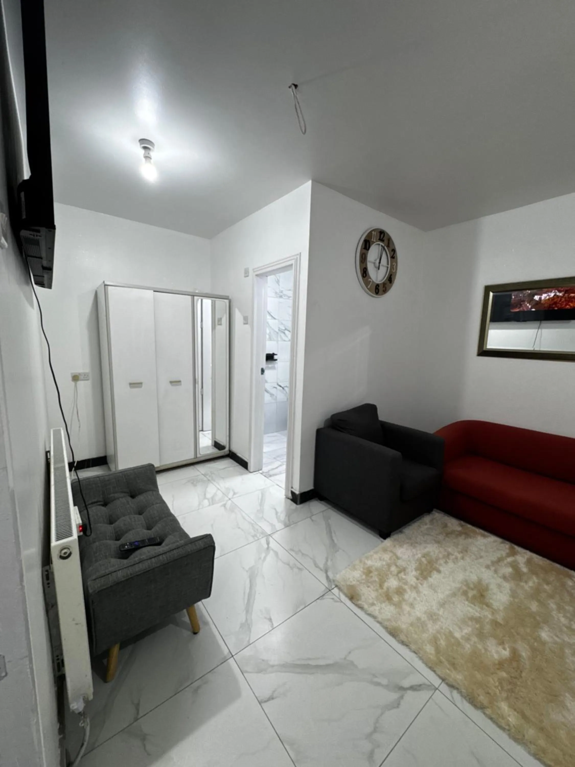 Seating area in OYO Unique Guestroom - Farnworth, Easy Access to Bolton