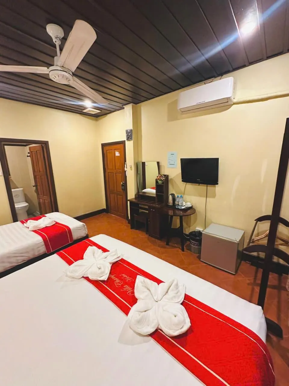 Bed in Luang Prabang Champa Villa Hotel