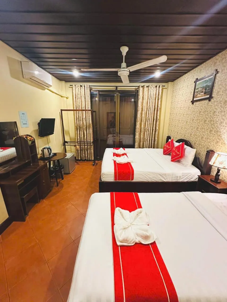 Bed in Luang Prabang Champa Villa Hotel