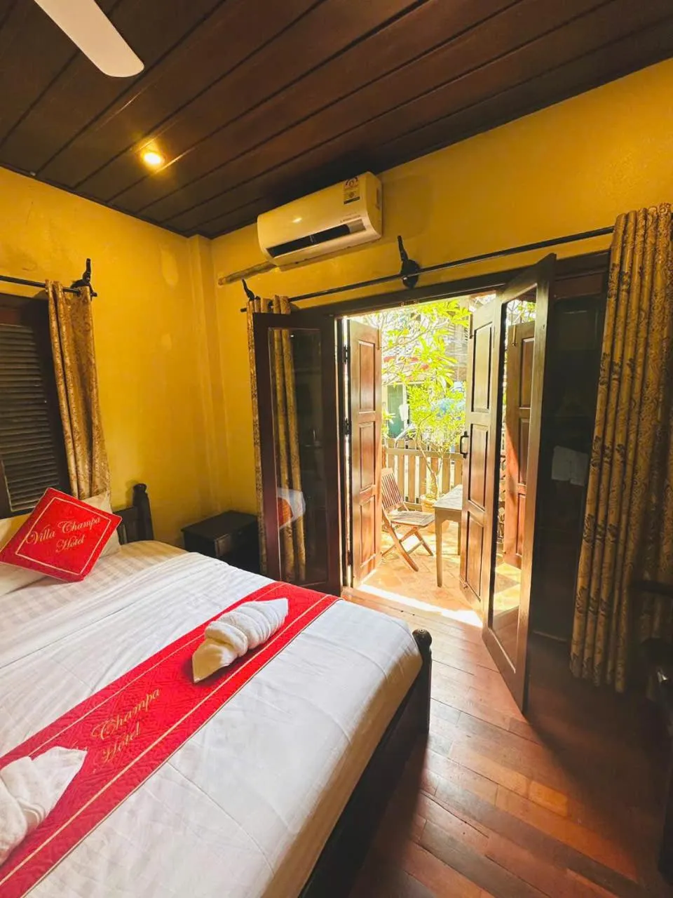 Photo of the whole room, Bed in Luang Prabang Champa Villa Hotel
