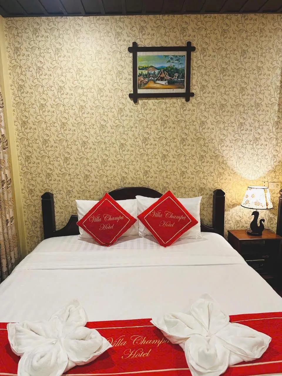 Bed in Luang Prabang Champa Villa Hotel