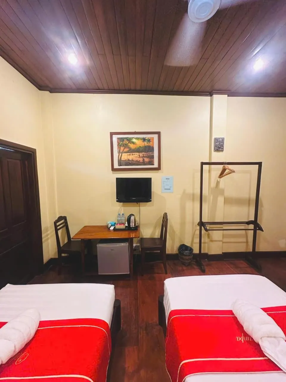 Communal lounge/ TV room, Bed in Luang Prabang Champa Villa Hotel