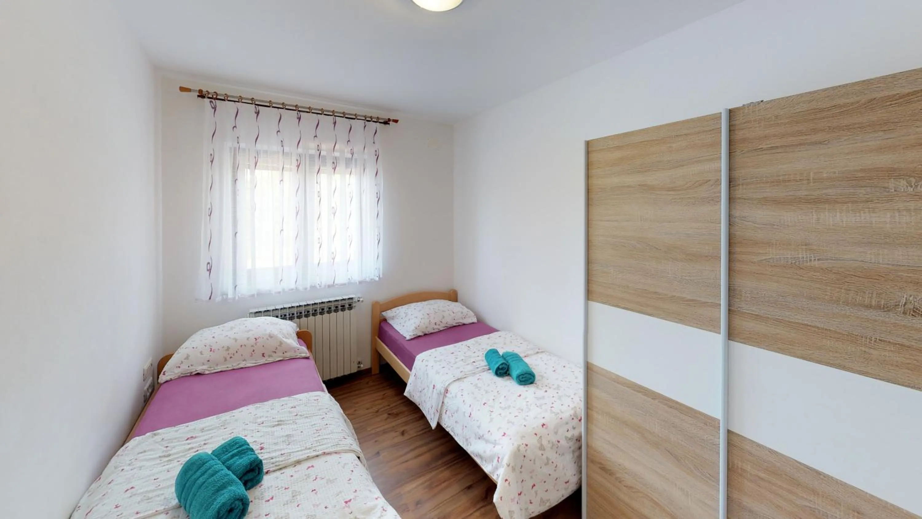 Bed in Apartments Goga