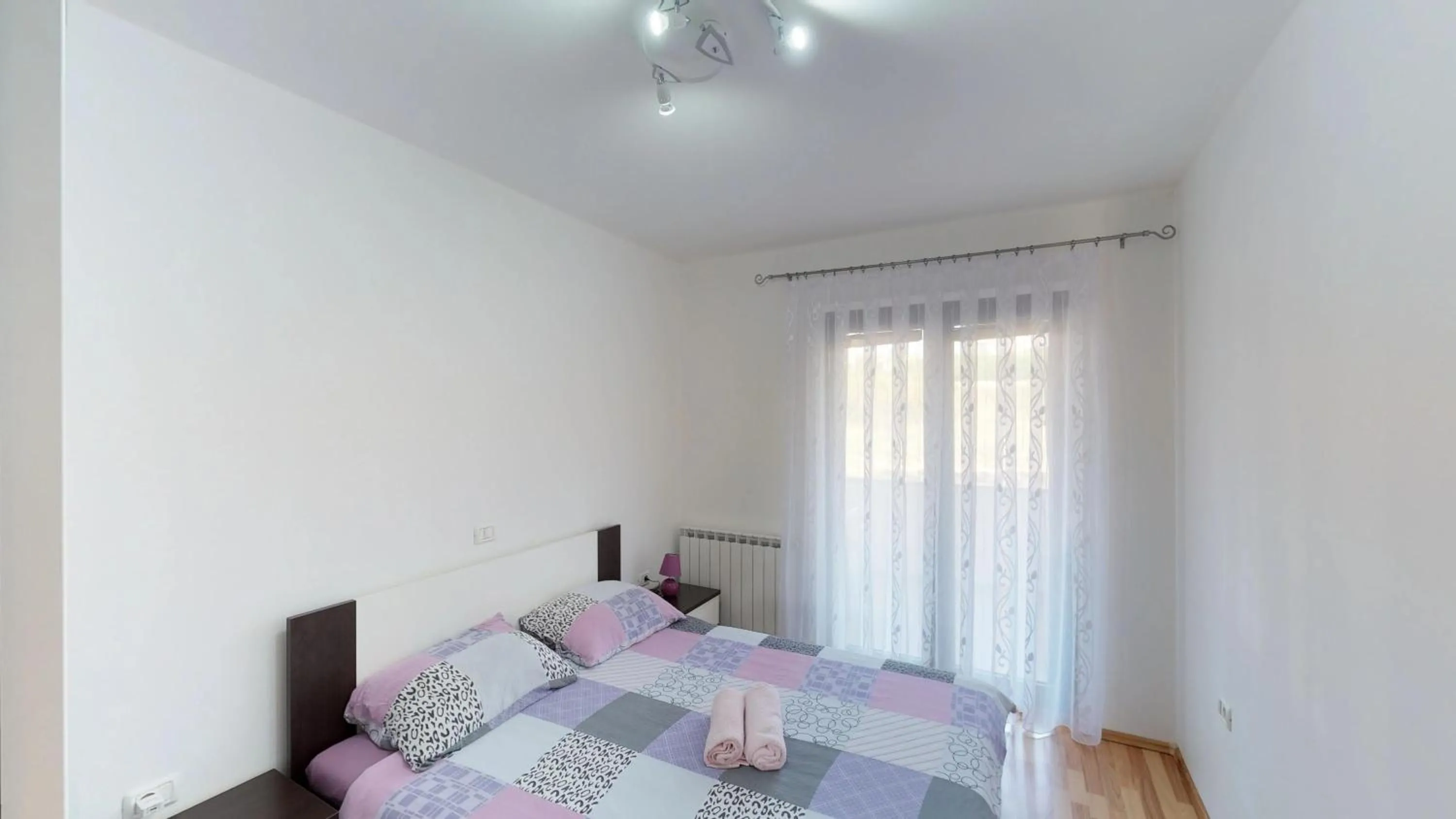 Bed in Apartments Goga