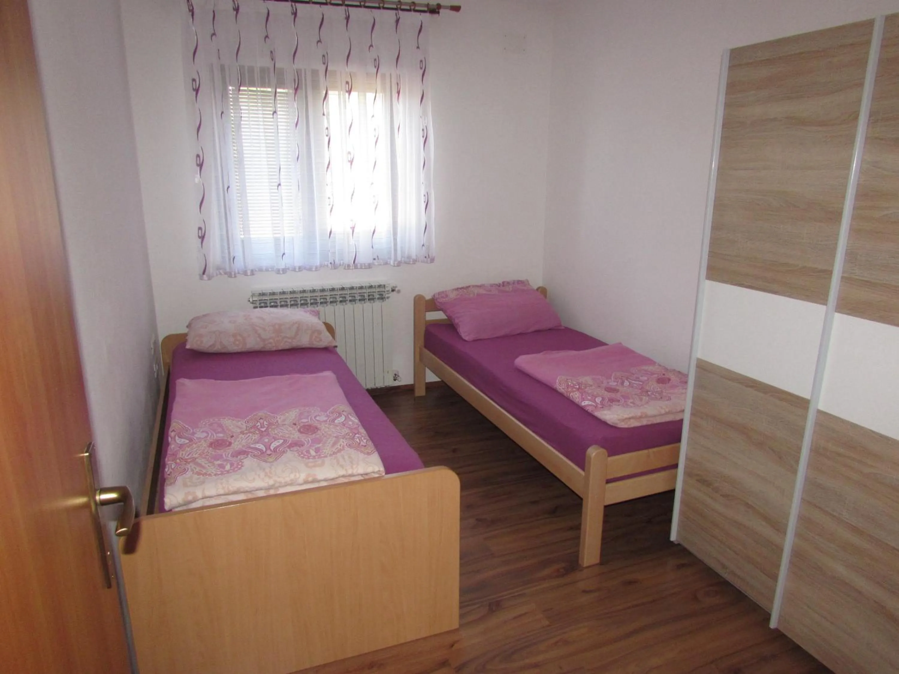 Bed in Apartments Goga