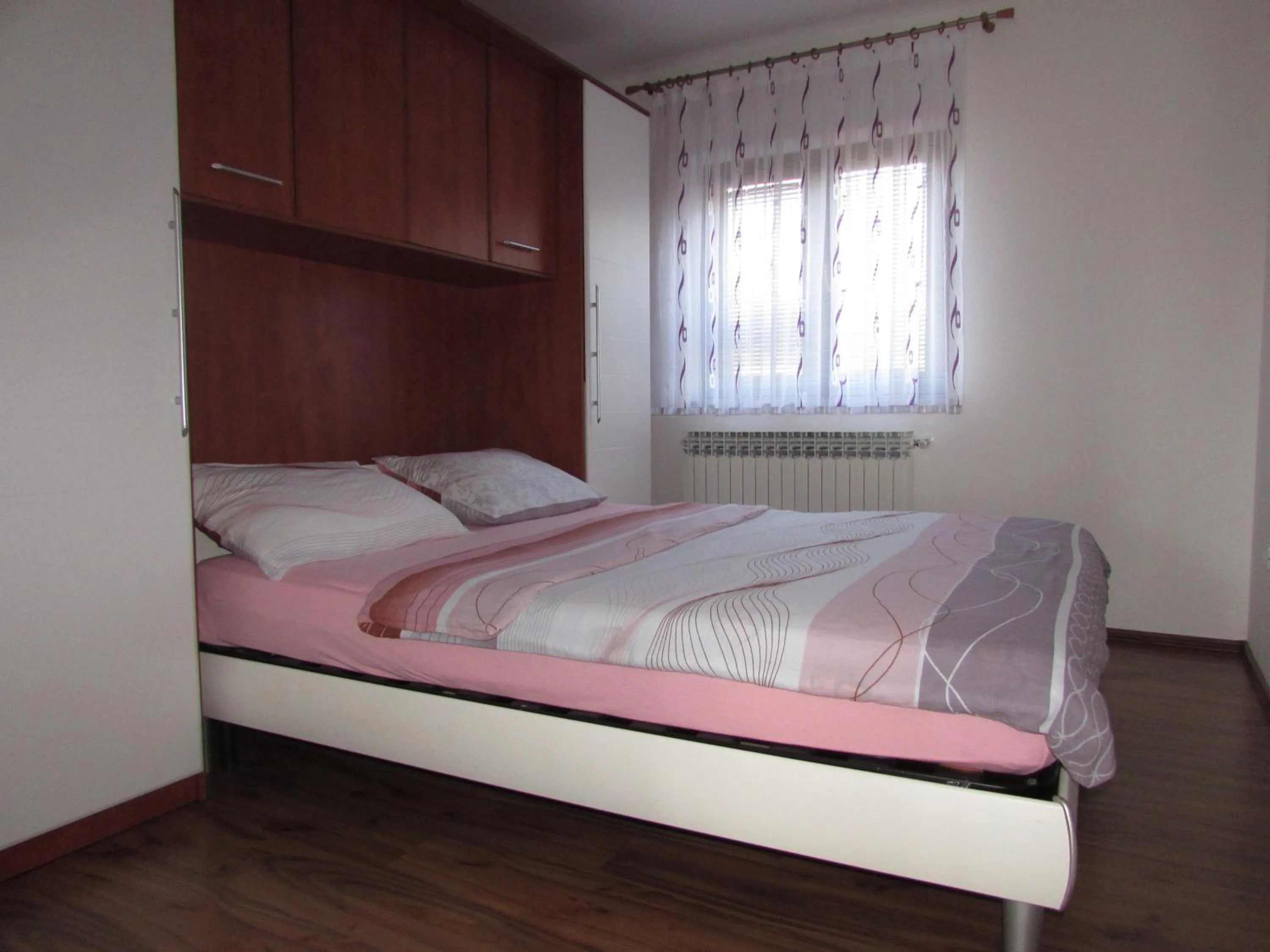 Bed in Apartments Goga