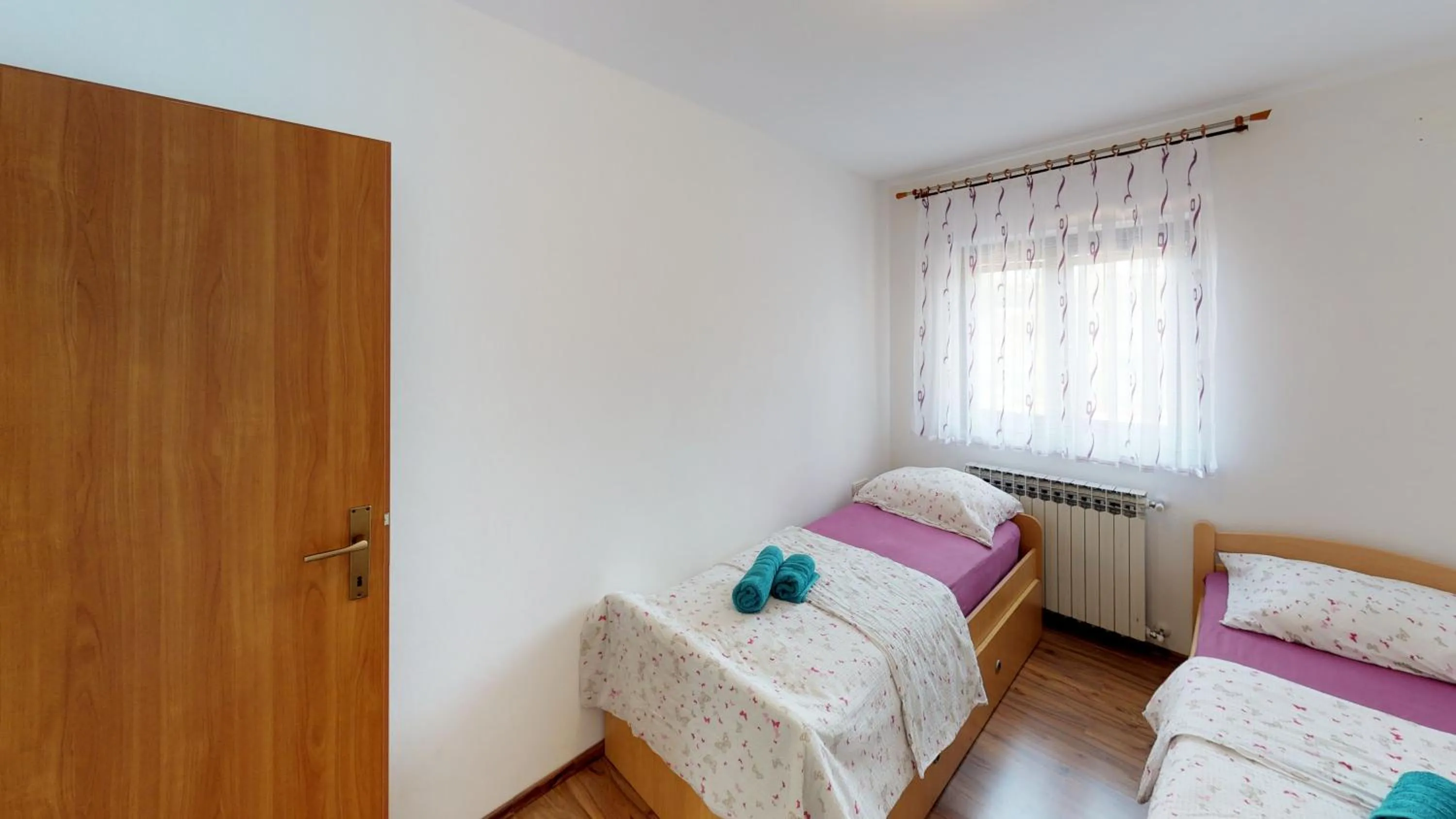 Bed in Apartments Goga