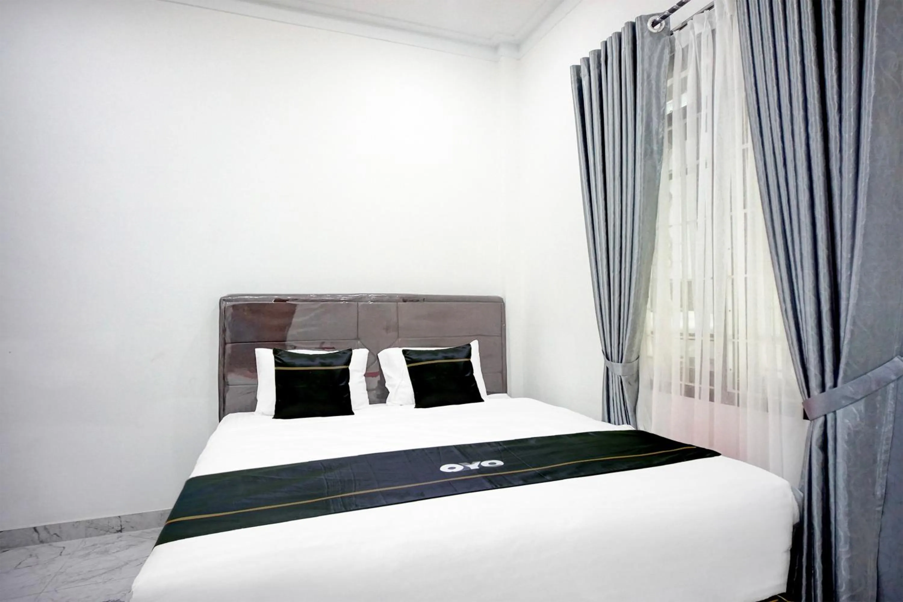 Bedroom, Bed in Hotel O Sm Raja Guest House