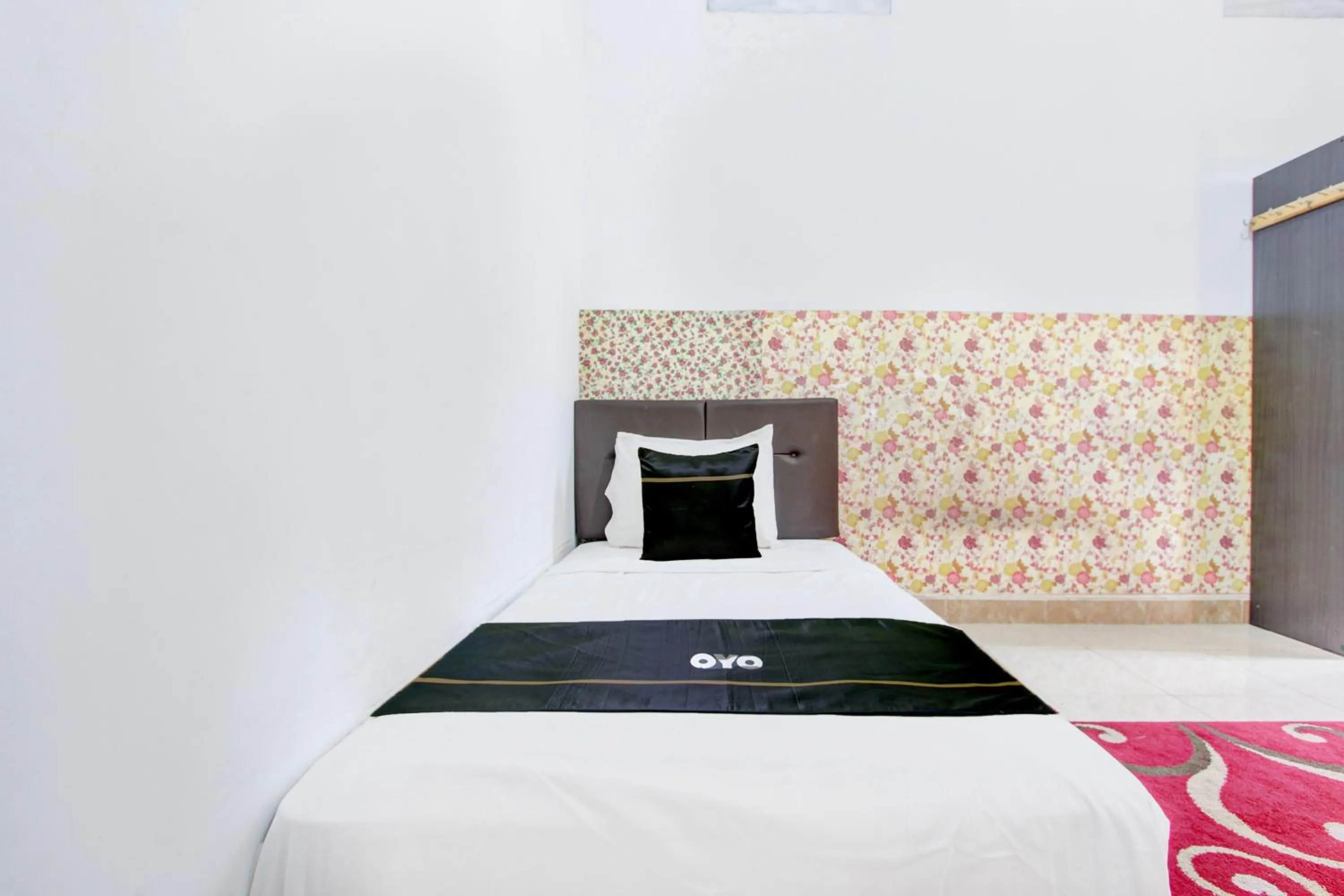 Bed in SPOT ON Podomoro Homestay