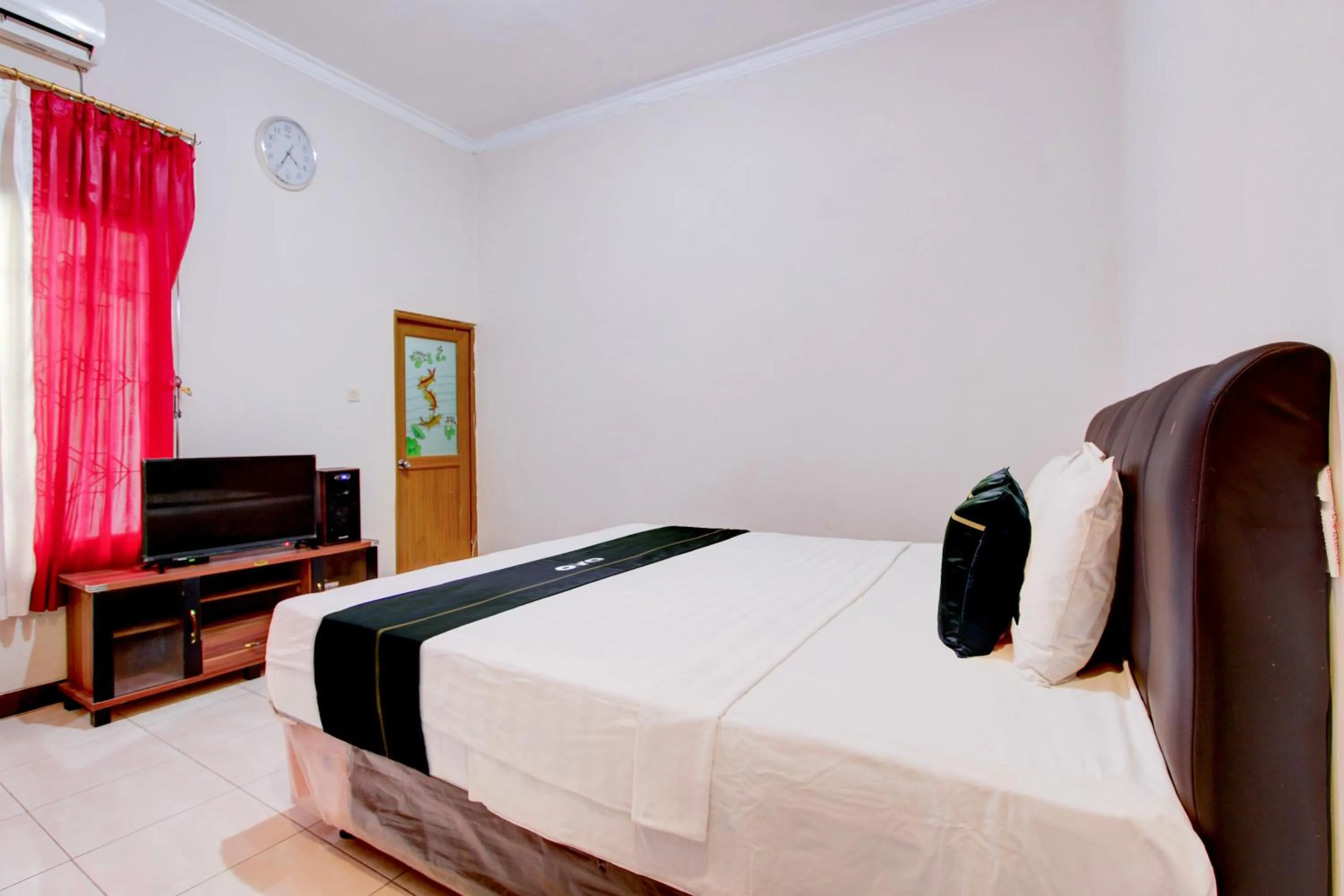 Bed in SPOT ON Podomoro Homestay