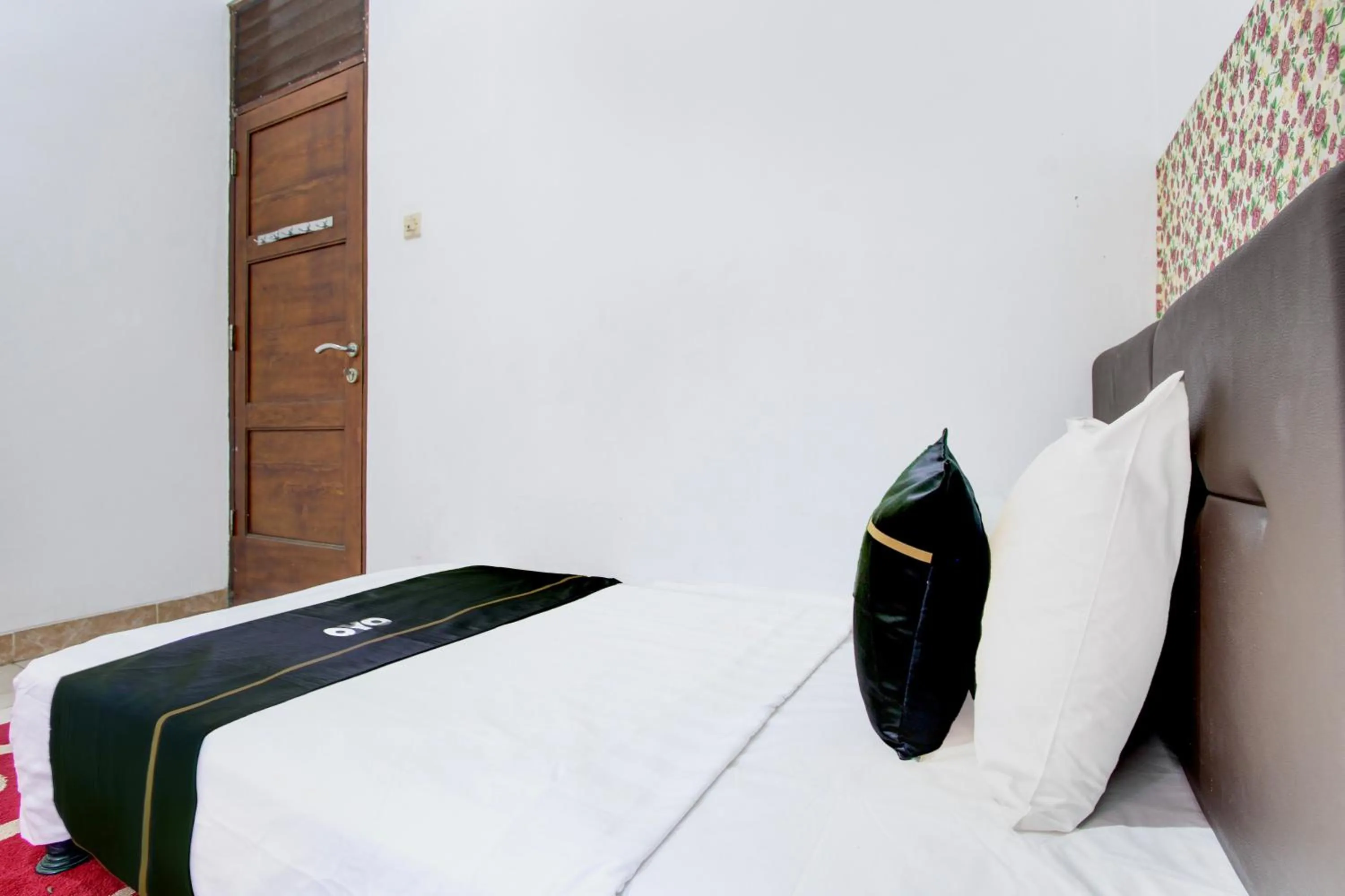 Bed in SPOT ON Podomoro Homestay