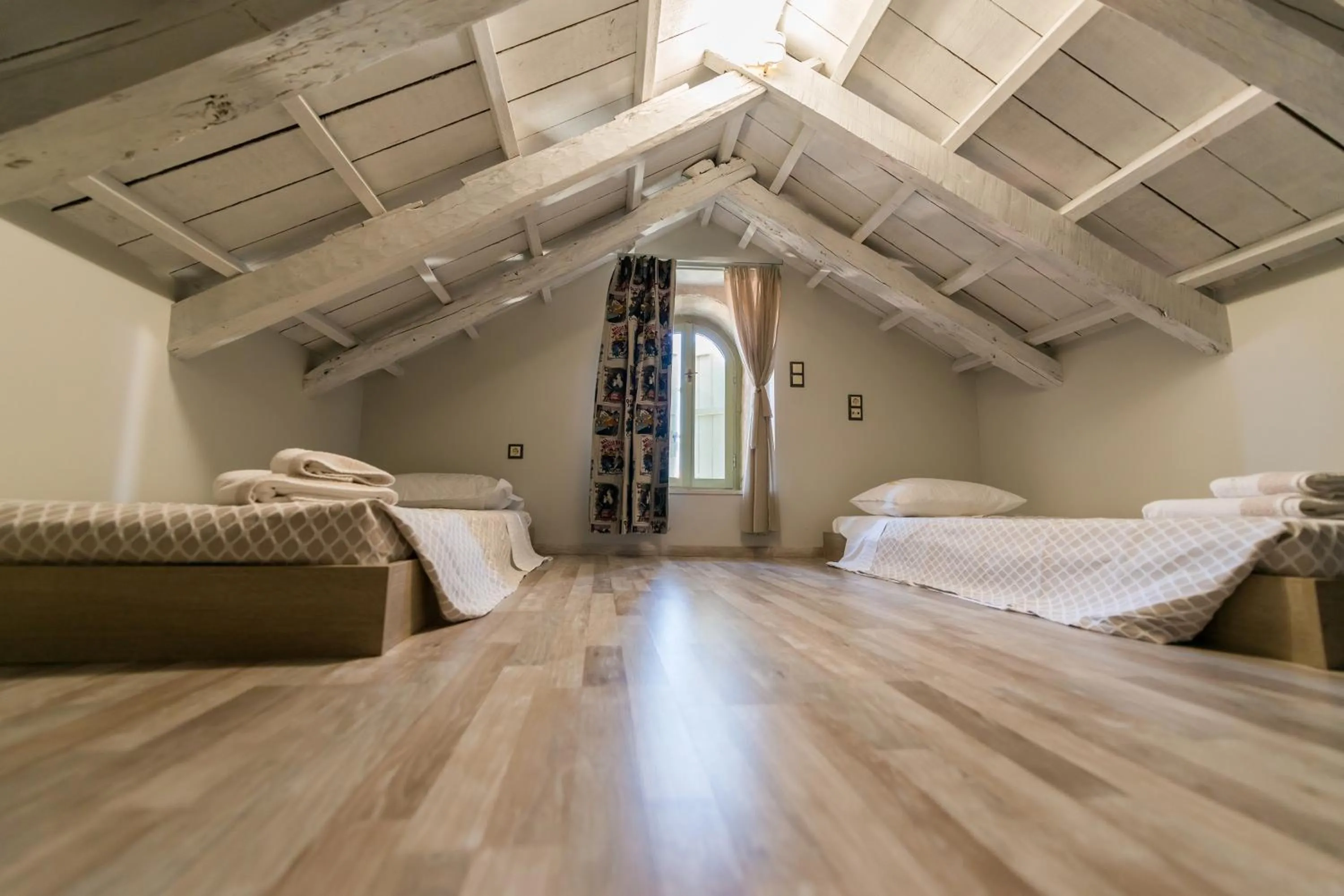 Bed in Fiscardonna Luxury Suites