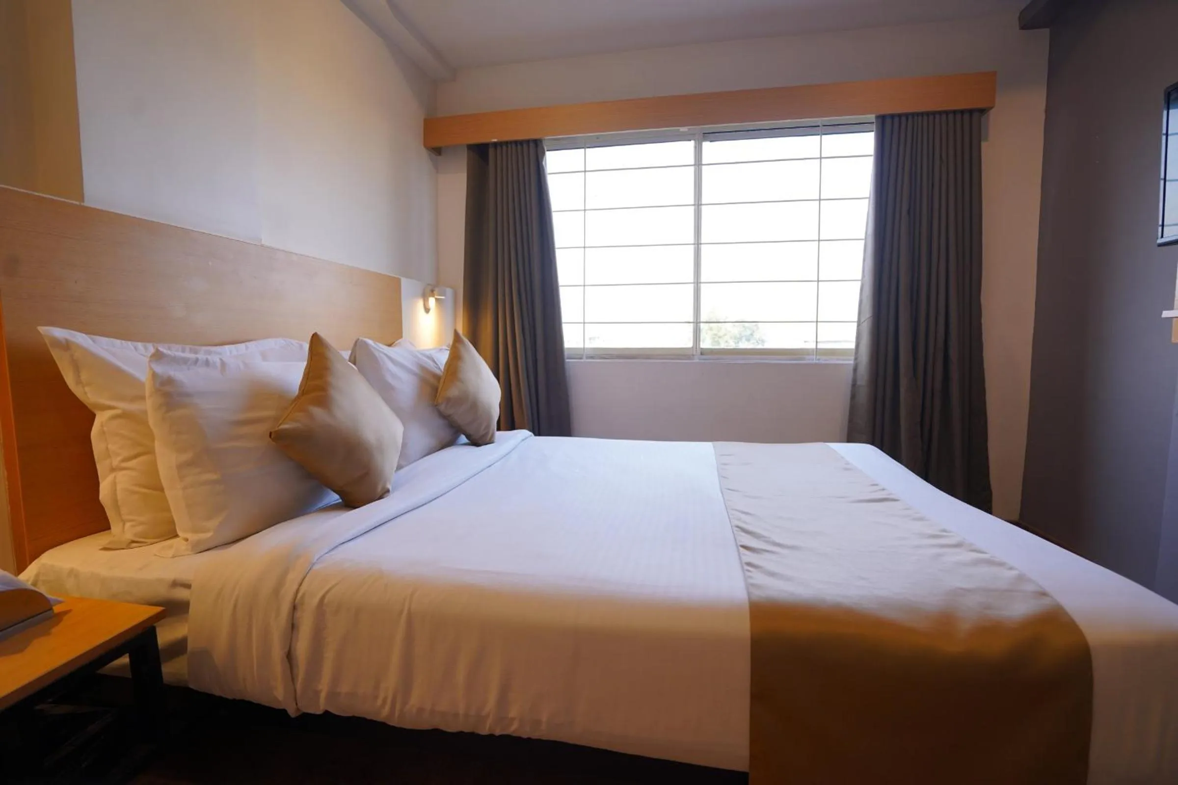 Bed in The Byke Business Hotel Landmark