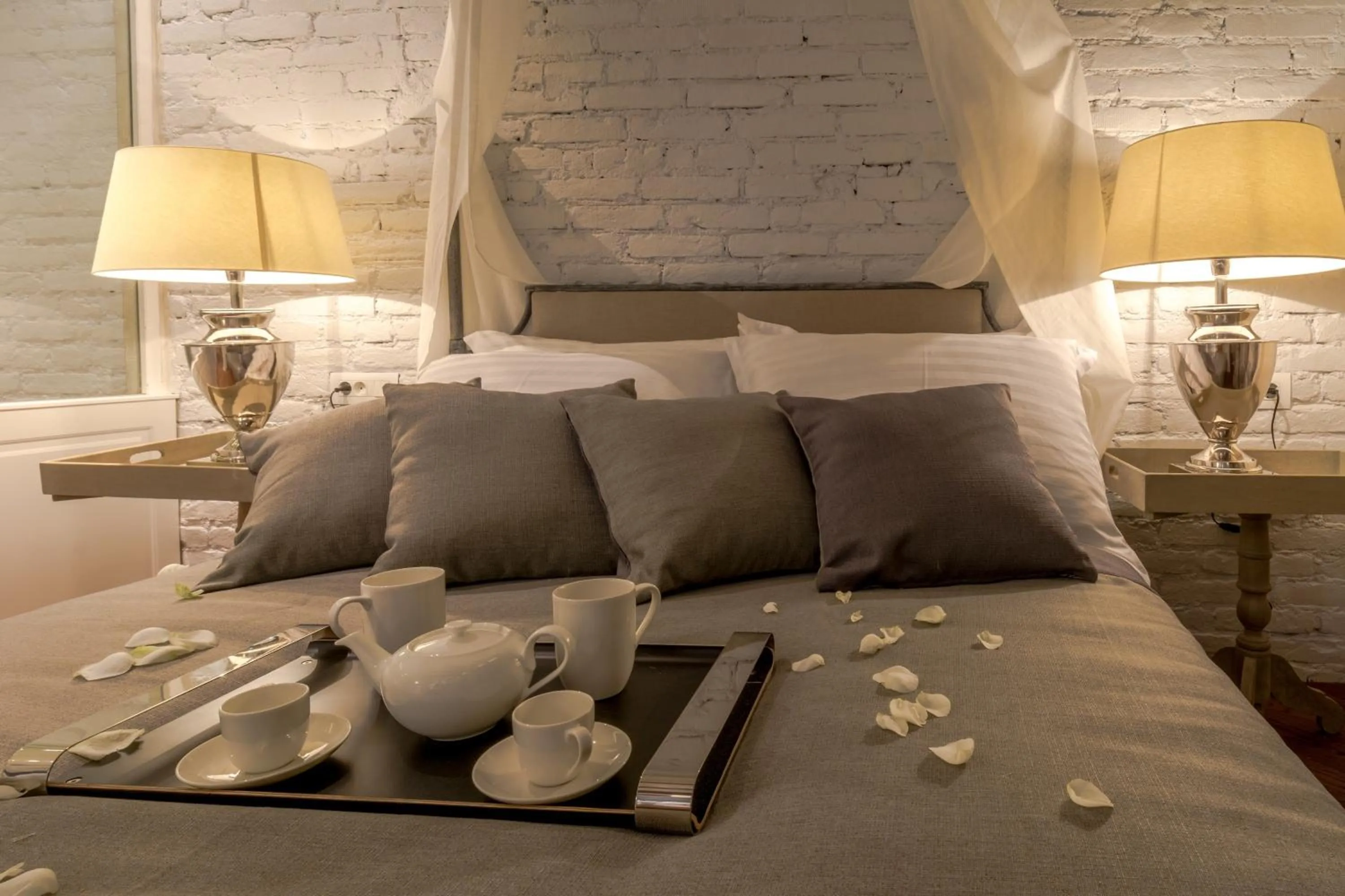 Bed in Procurator 7 Luxury Rooms