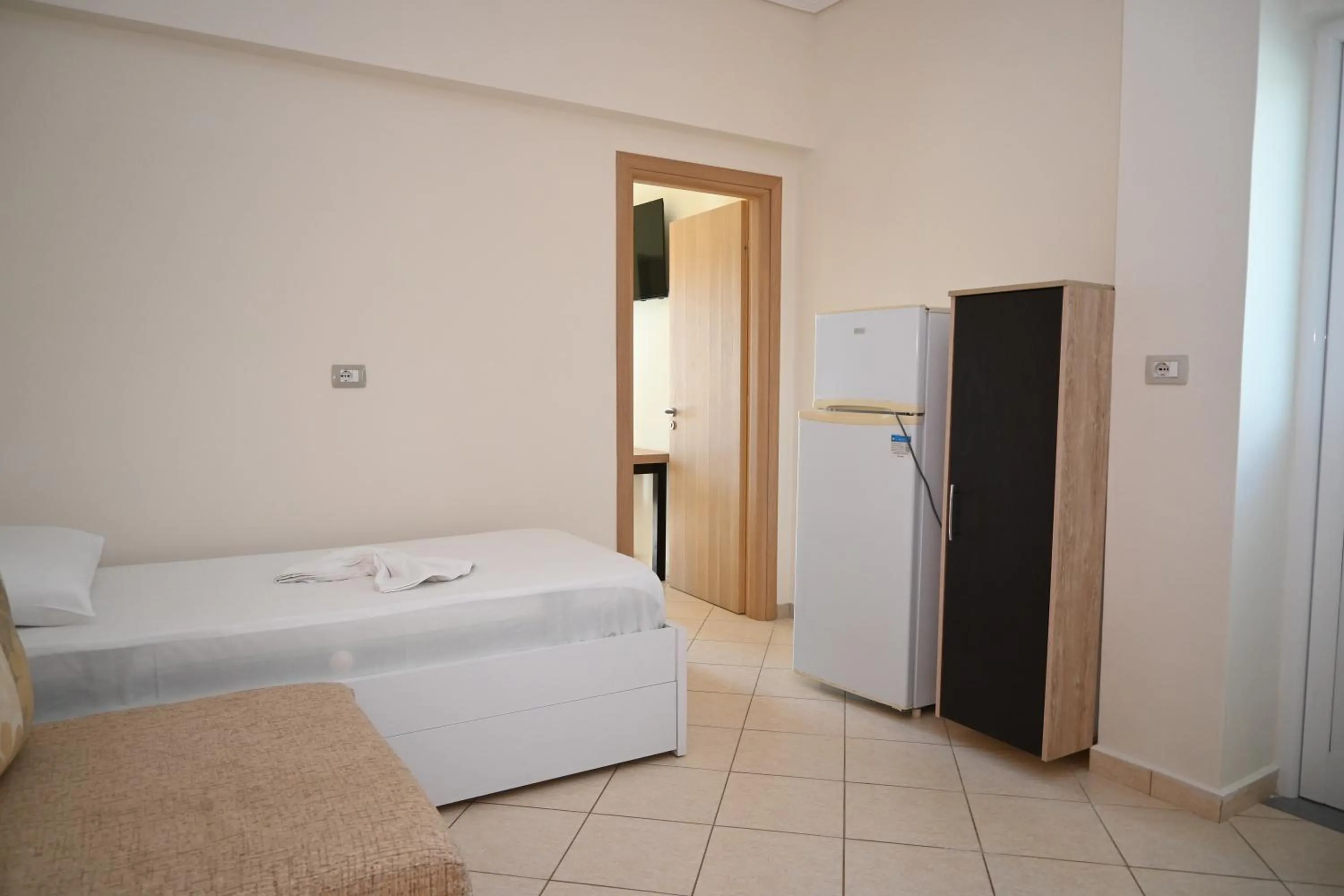 Bed in EROS HOTEL Ksamil