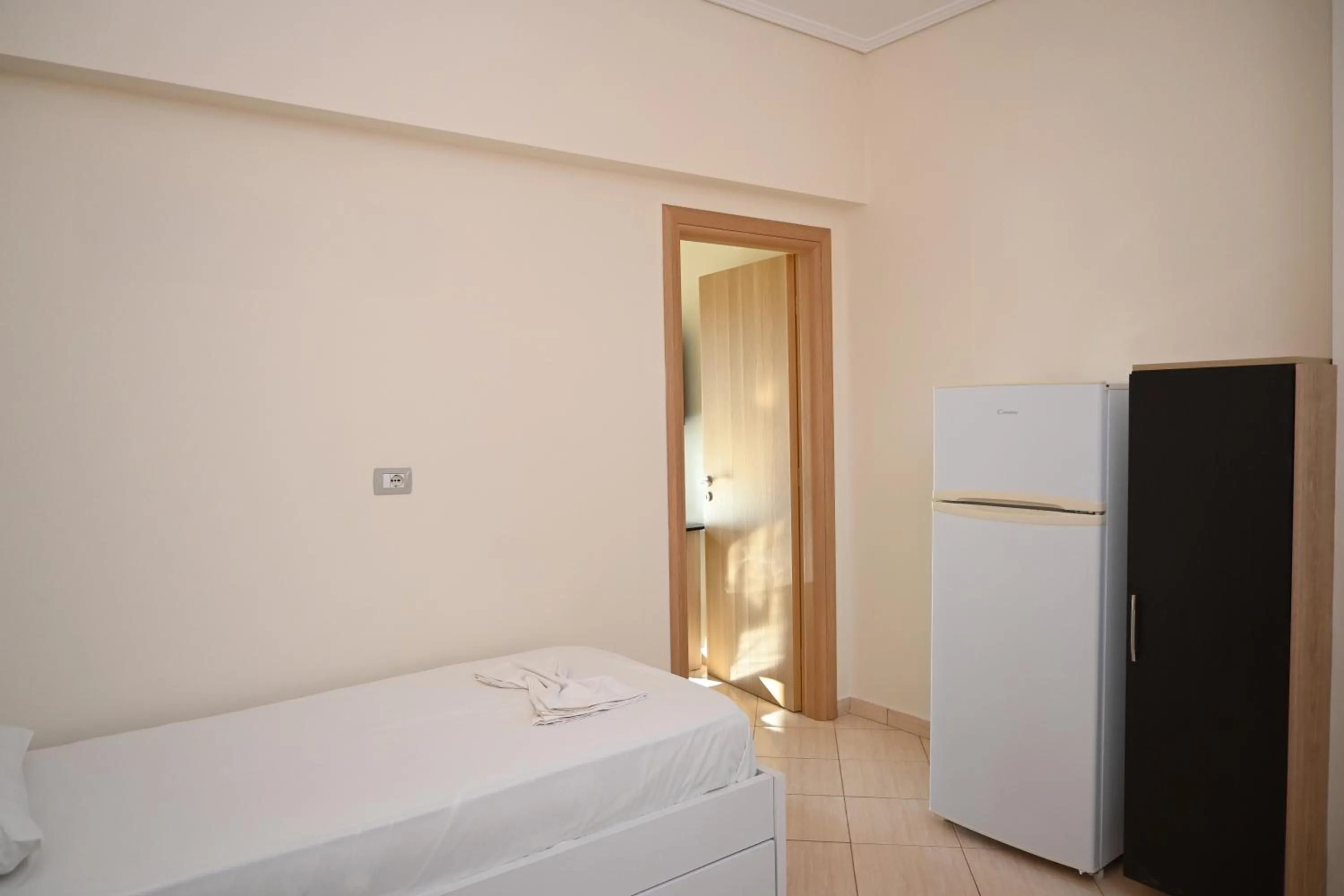 Bed in EROS HOTEL Ksamil