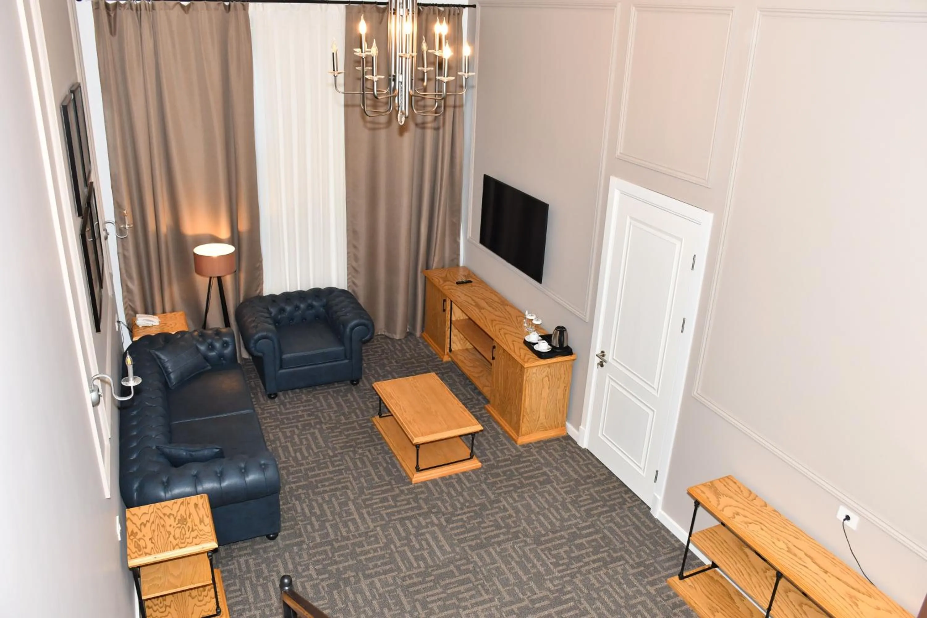 Communal lounge/ TV room in Callisto Baku