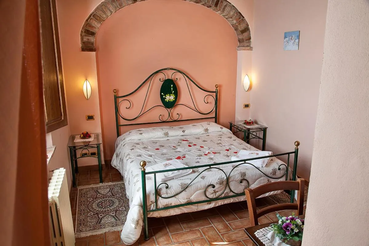 Bed in Agriturismo Sanguineto