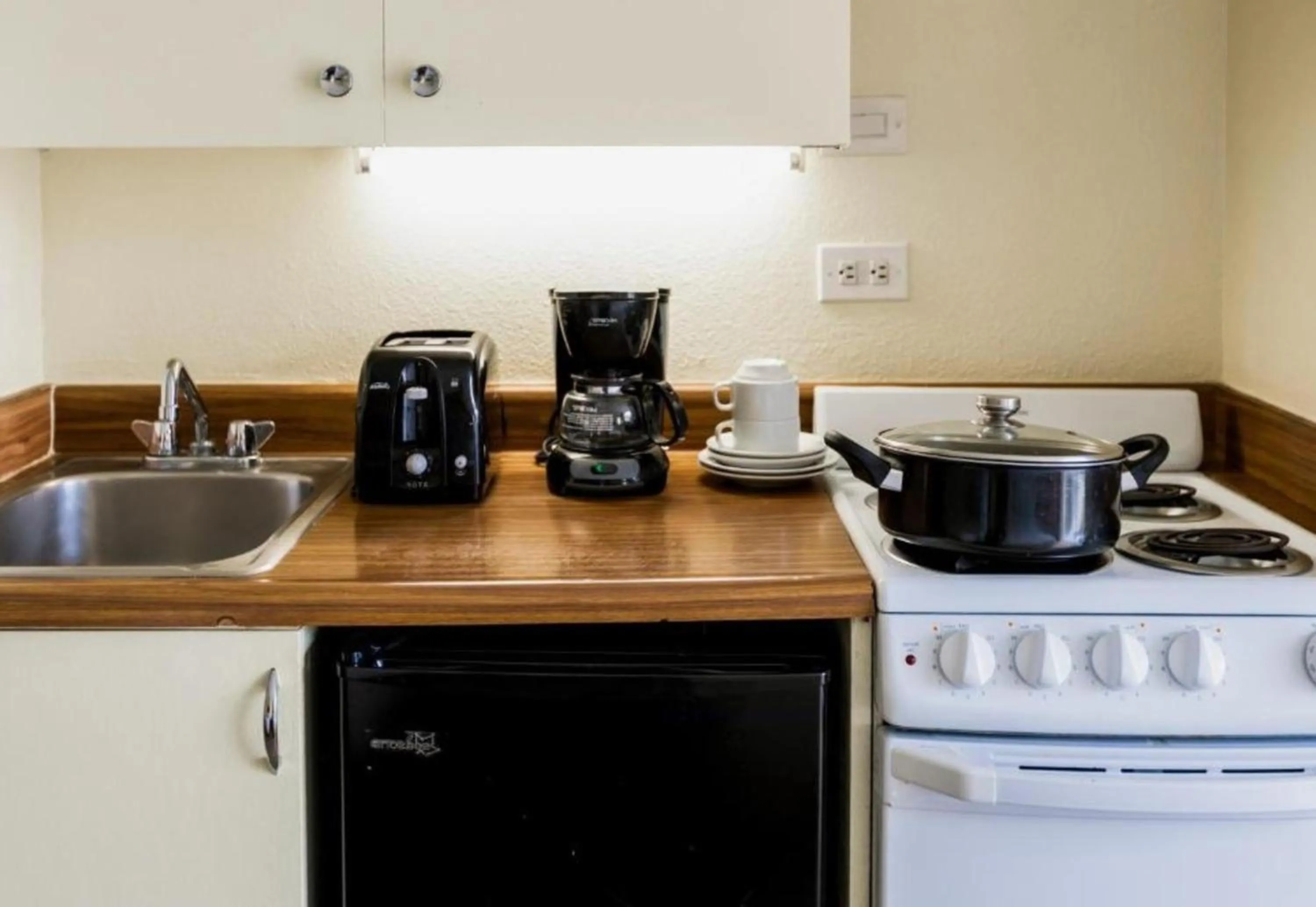 Kitchen or kitchenette in Ohia Waikiki Studio Suites