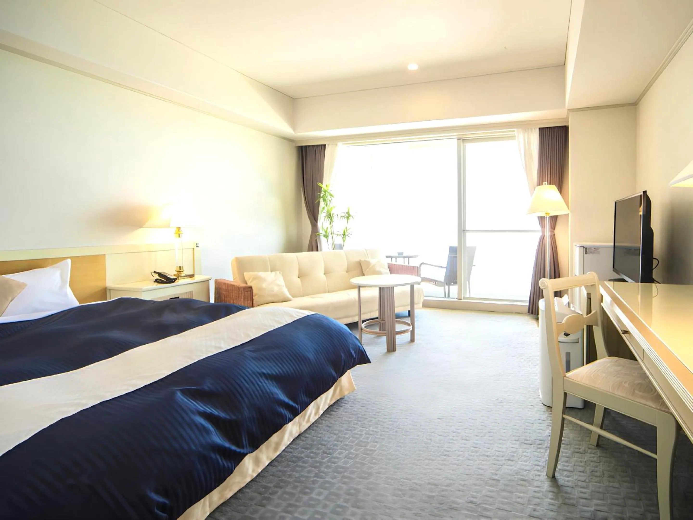 Bed in LiVEMAX RESORT Setouchi Sea Front