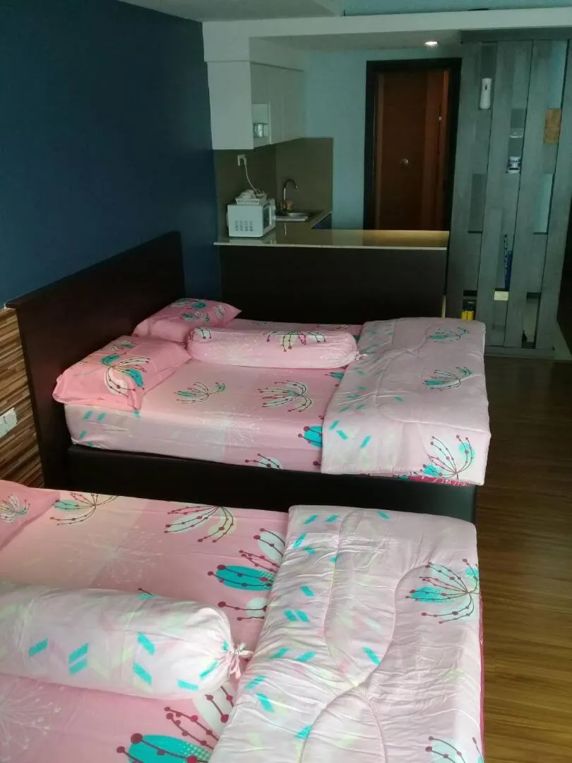 Bed in Best Studio Guest House