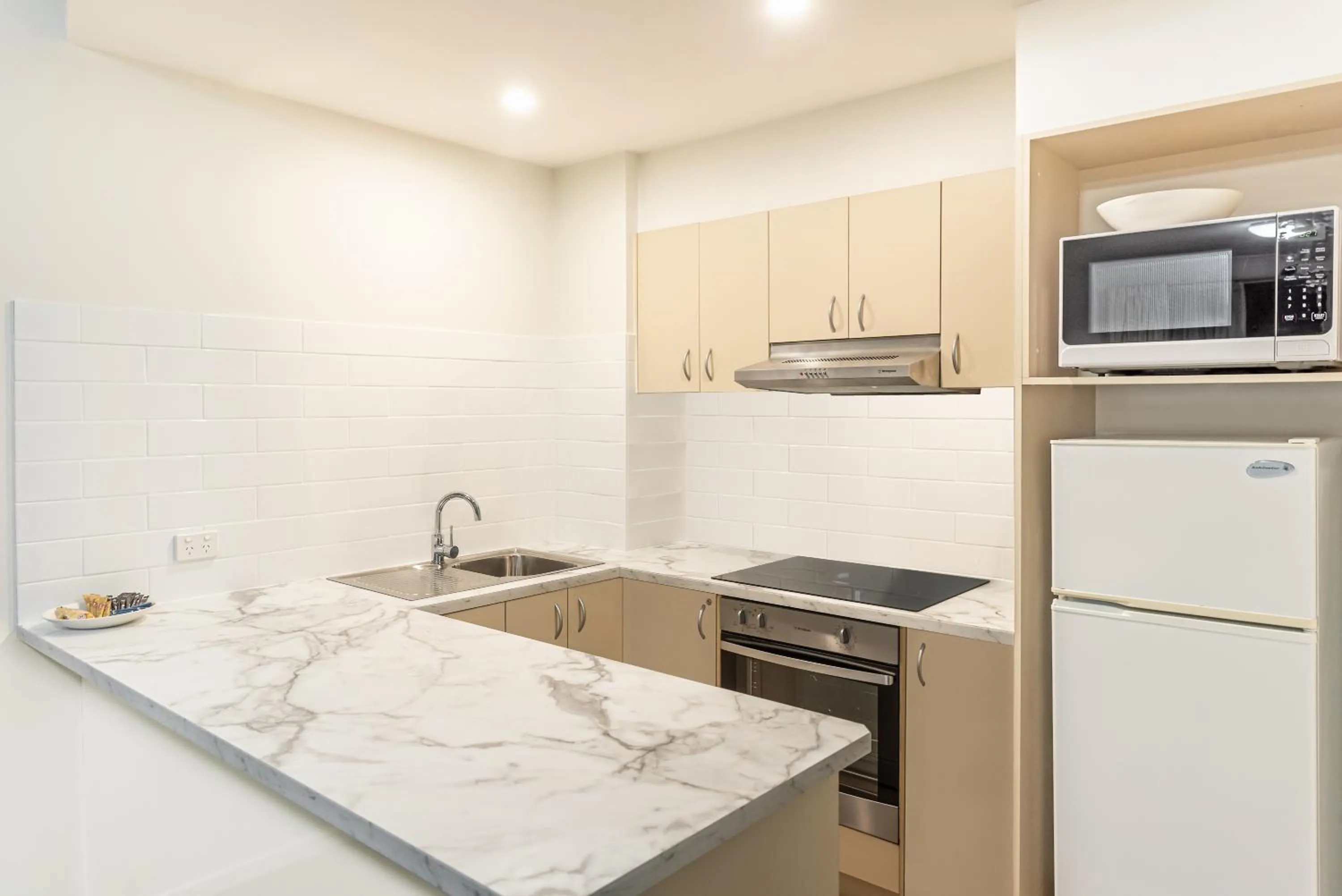 Kitchen or kitchenette in The Brighton Apartments