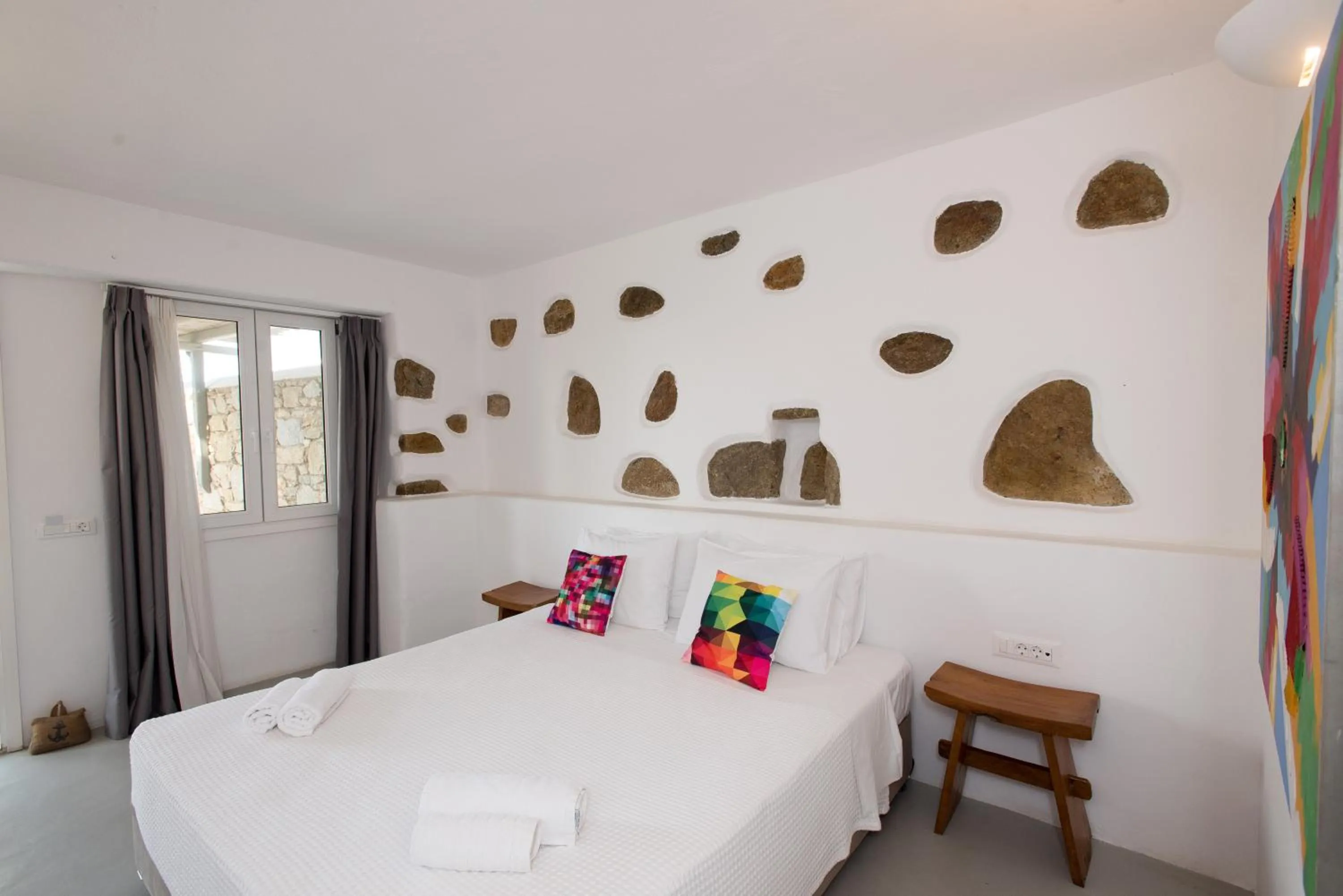 Bed in Bellou Suites