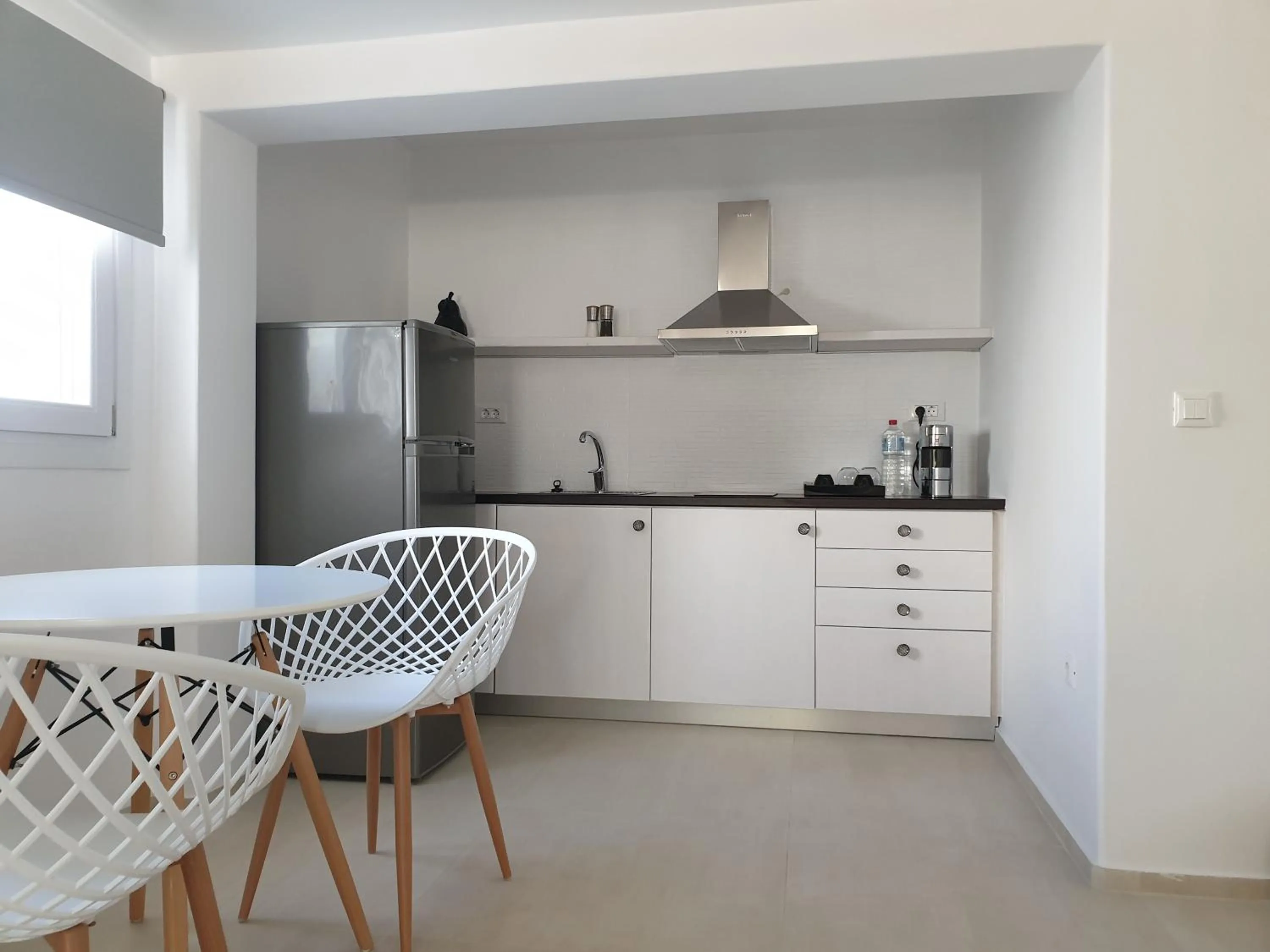 Kitchen or kitchenette in Bellou Suites