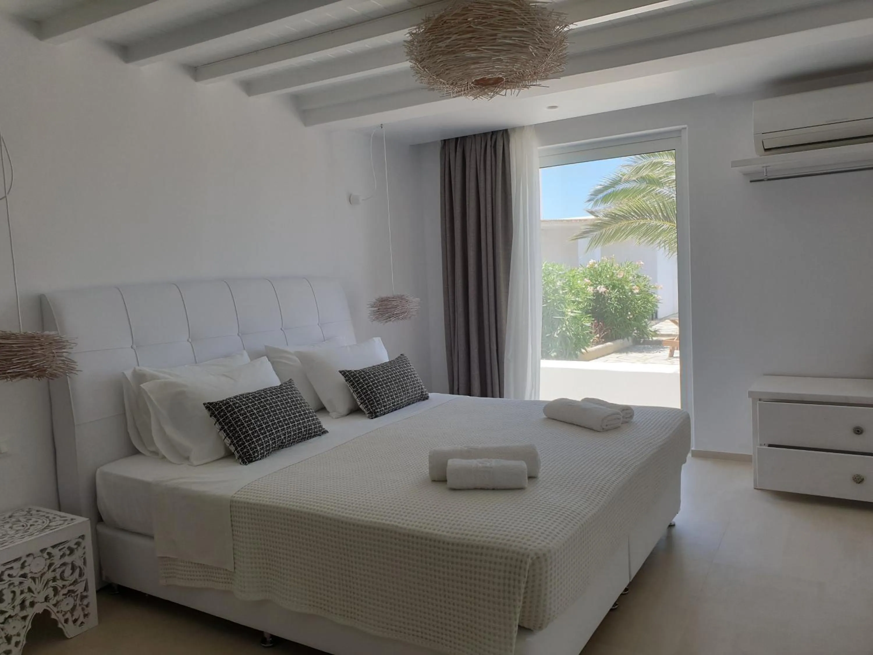 Bed in Bellou Suites