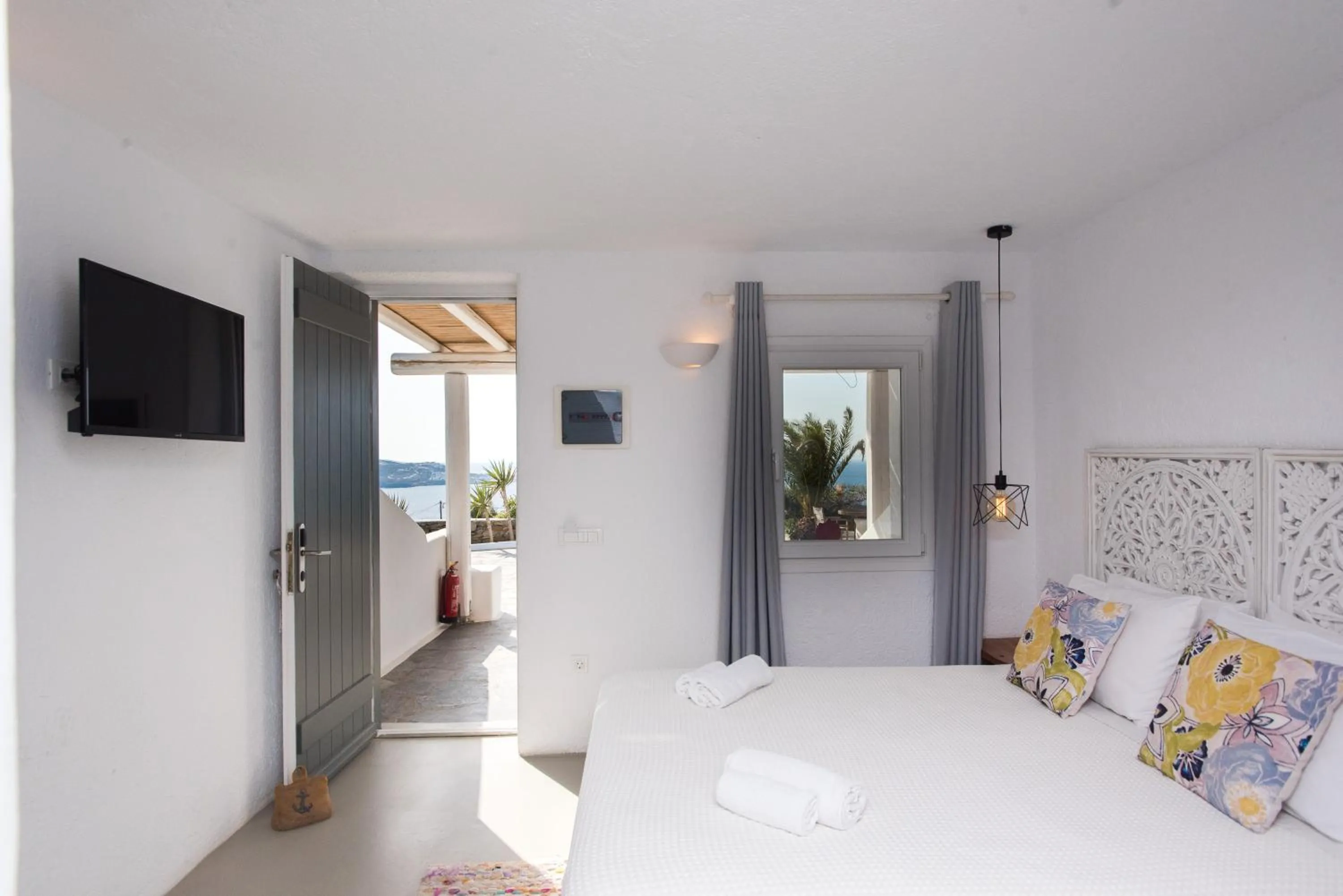 Bed in Bellou Suites