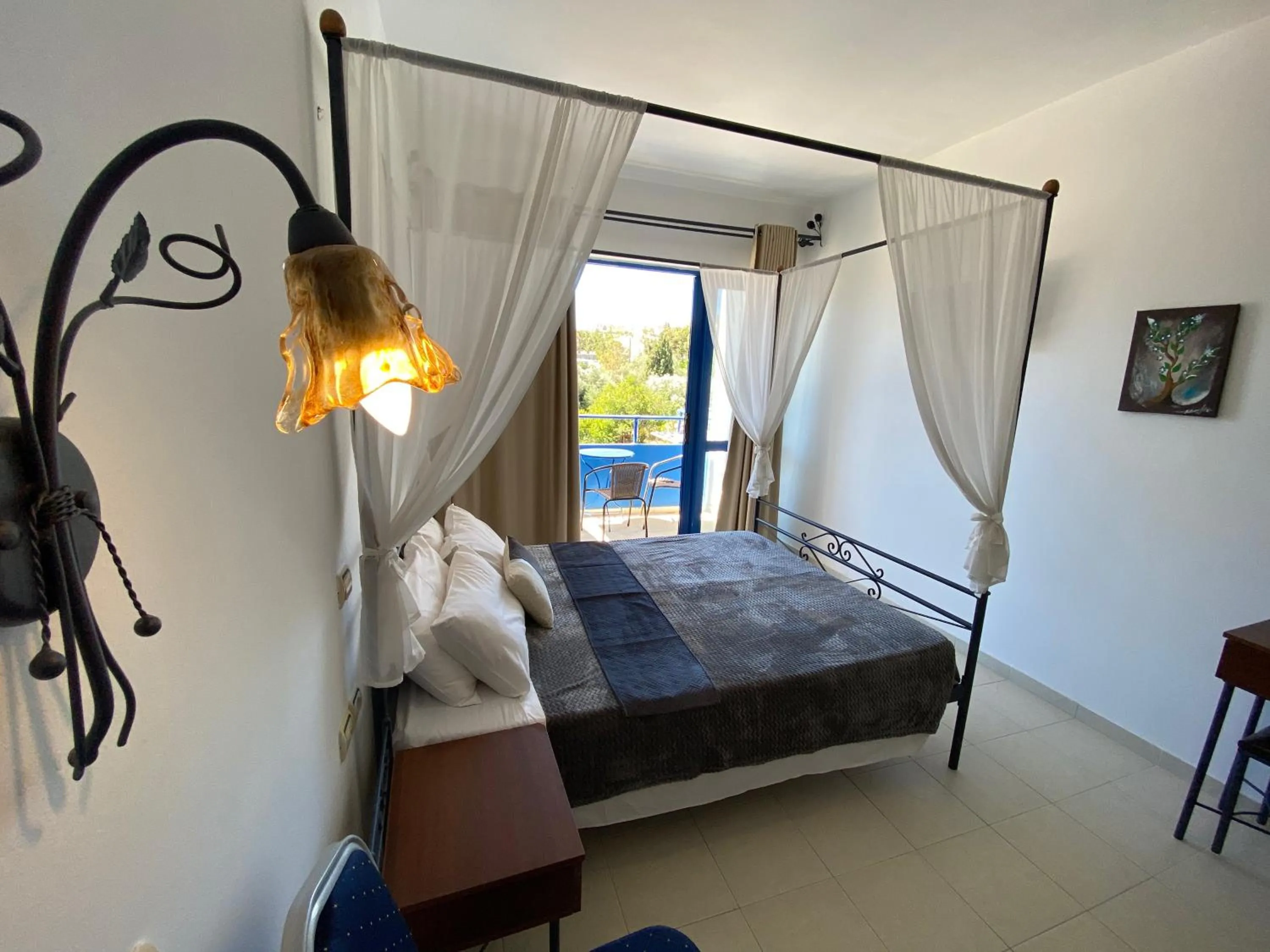 TV and multimedia in Anastasia Studios, Apartments & Suites