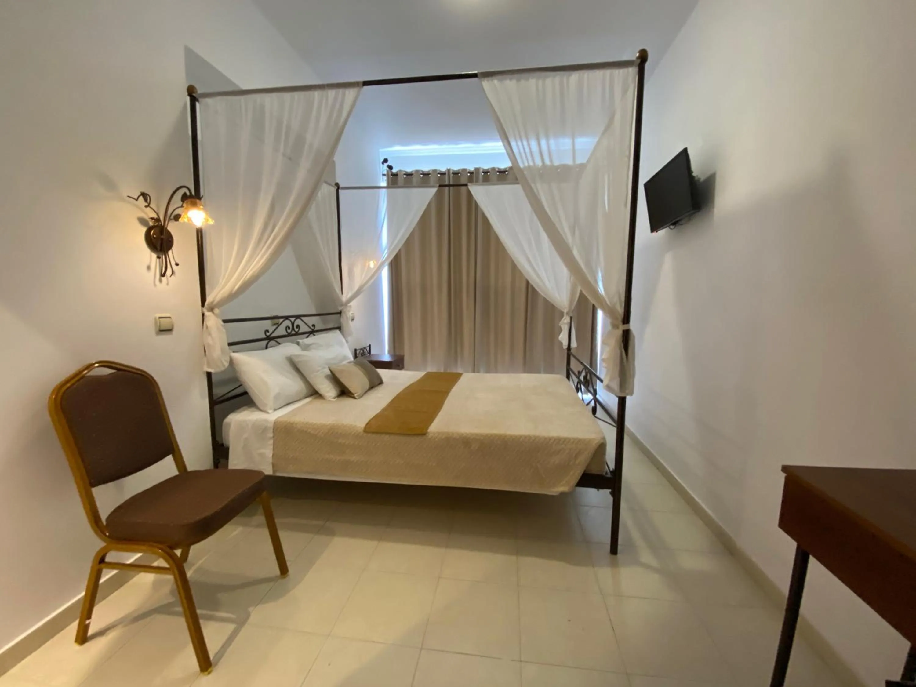 TV and multimedia in Anastasia Studios, Apartments & Suites