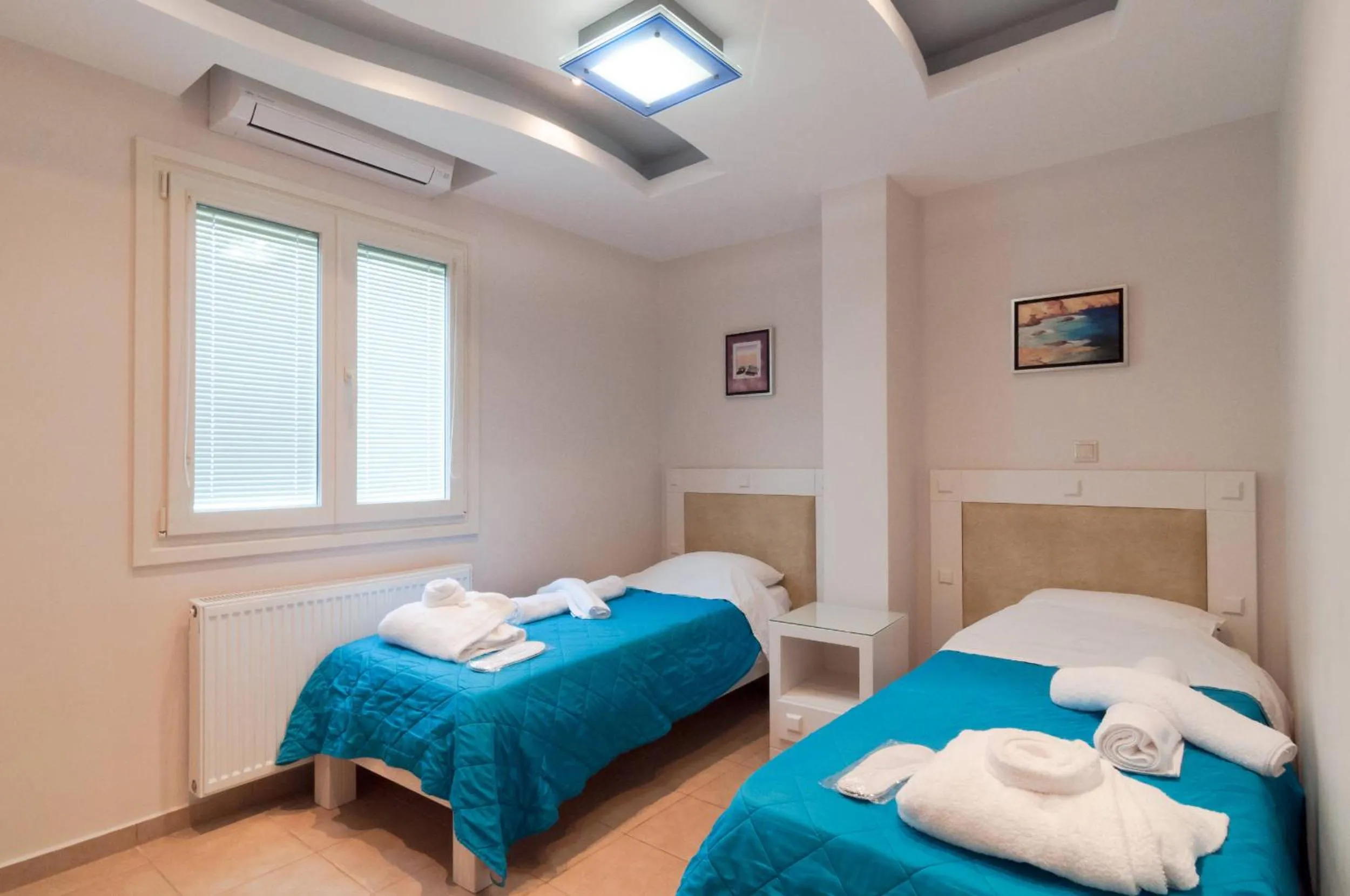 Bed in Villa Adriana Hotel