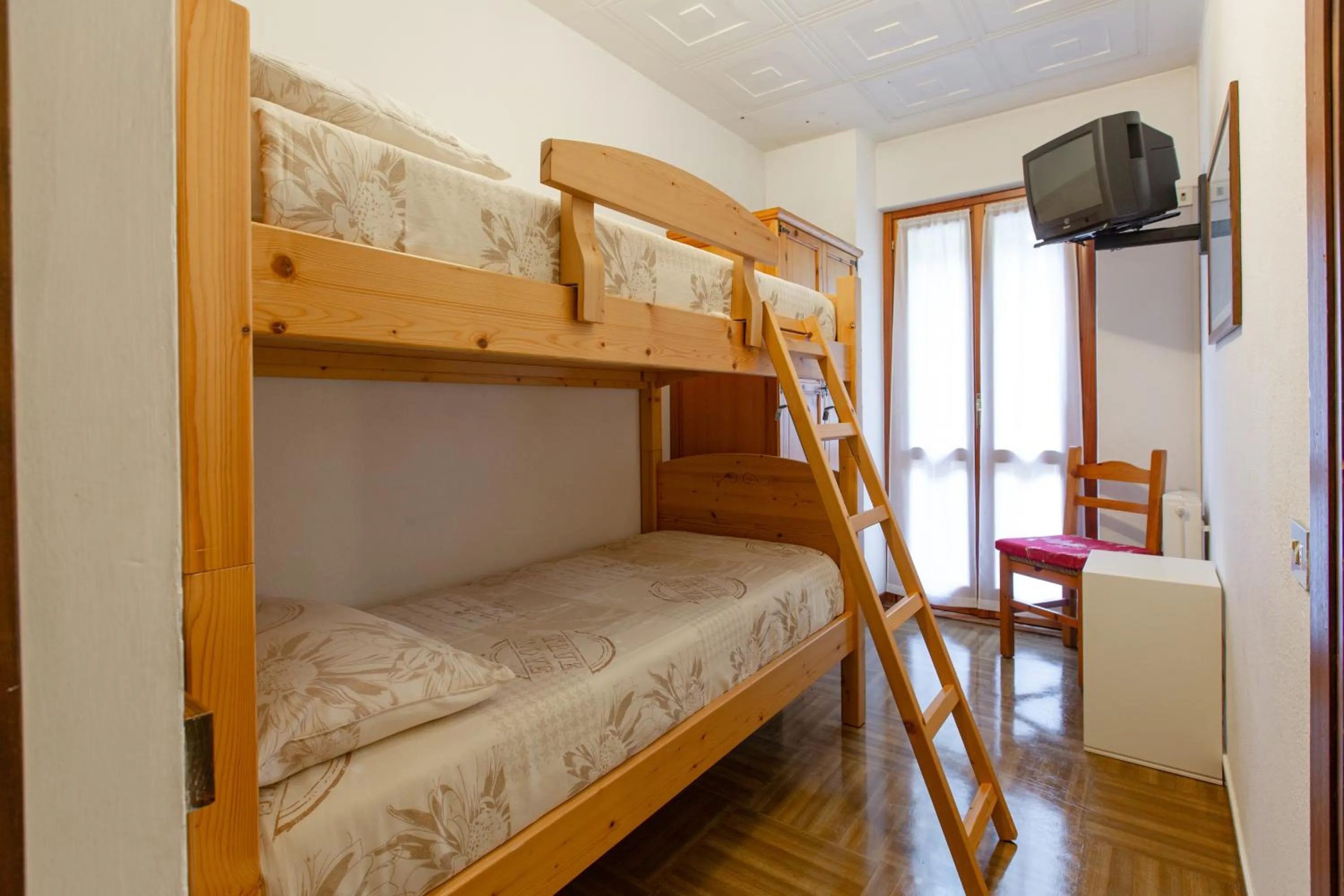 Bed in Hotel Biancospino