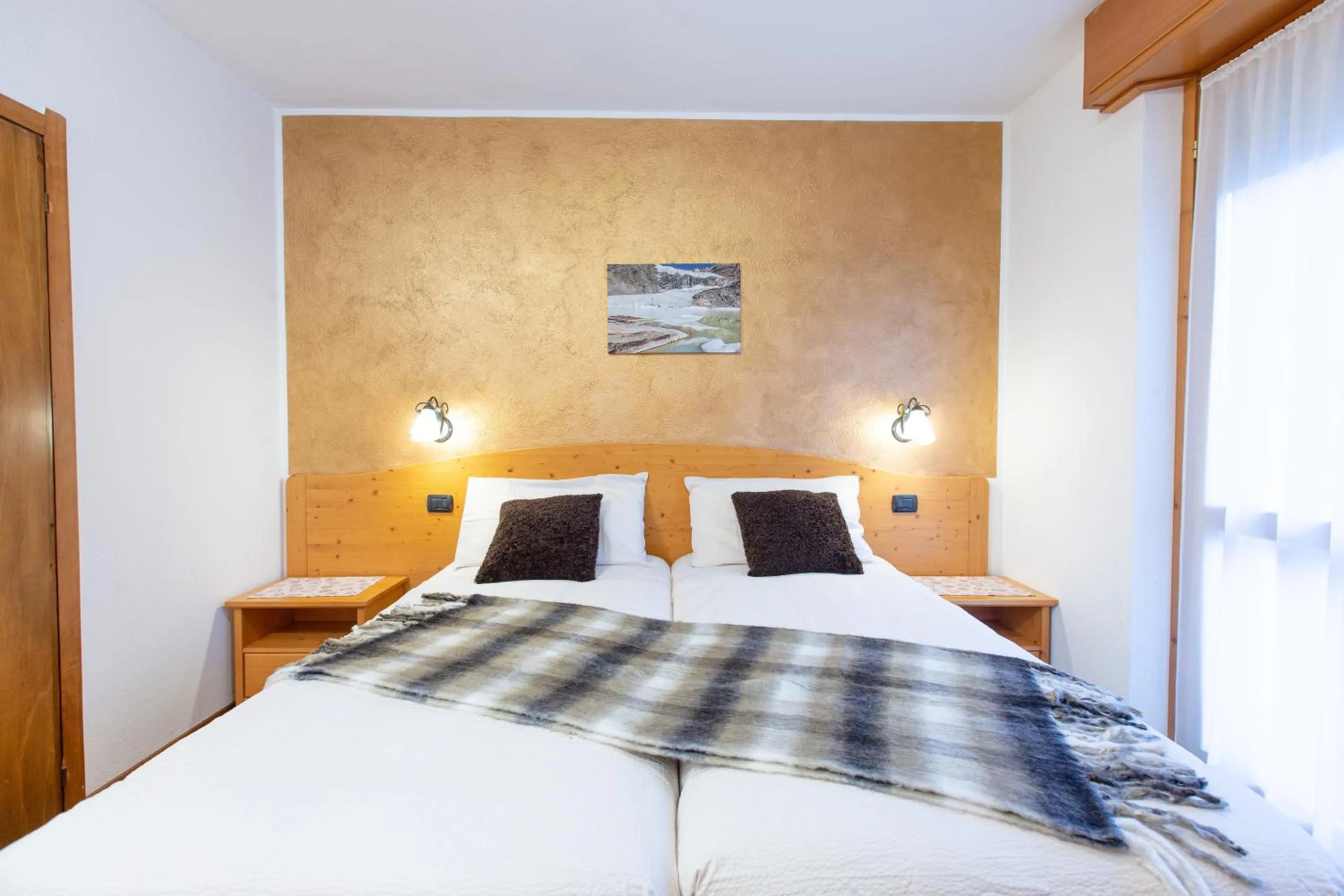 Bed in Hotel Biancospino