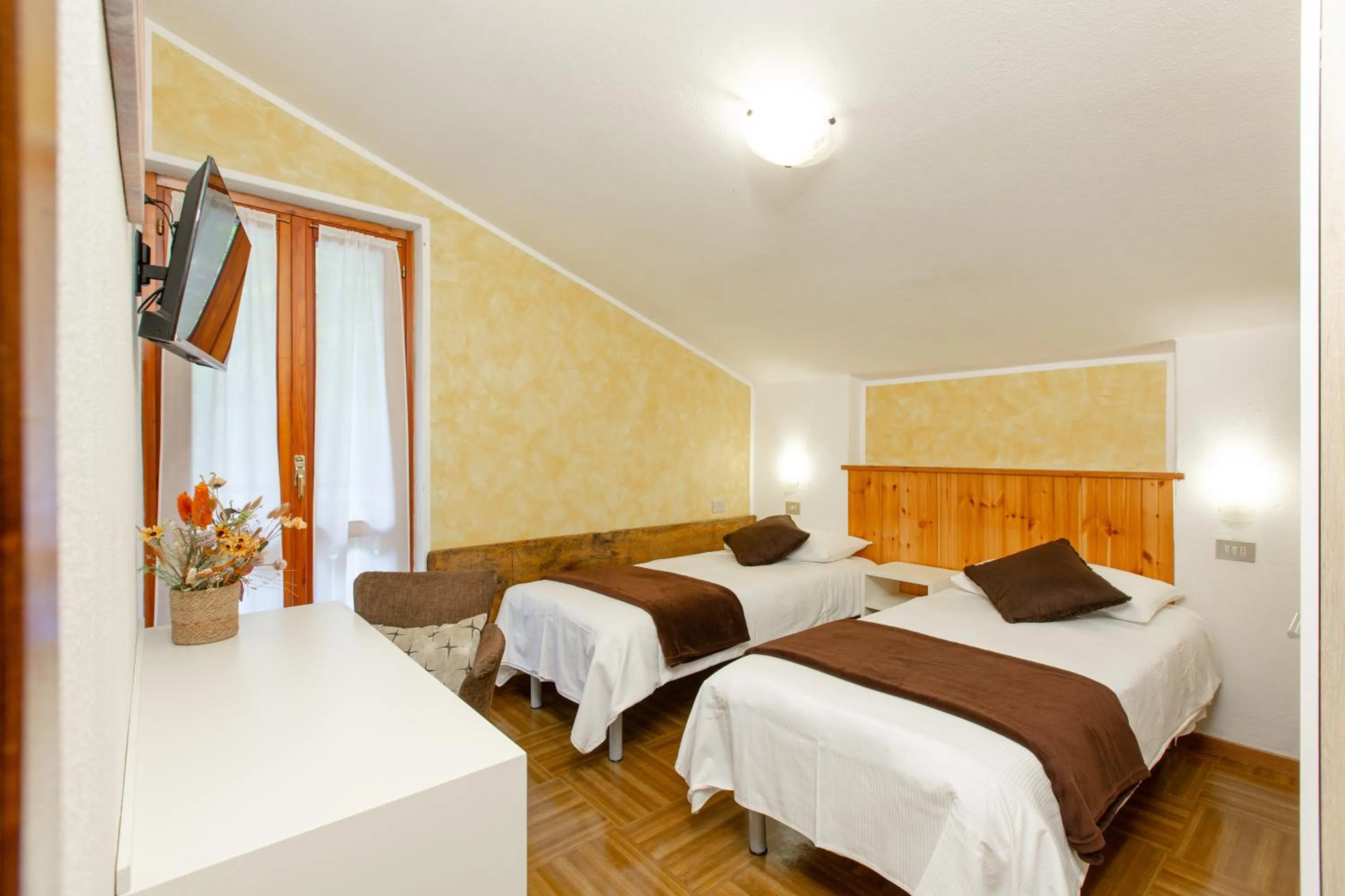 Bed in Hotel Biancospino