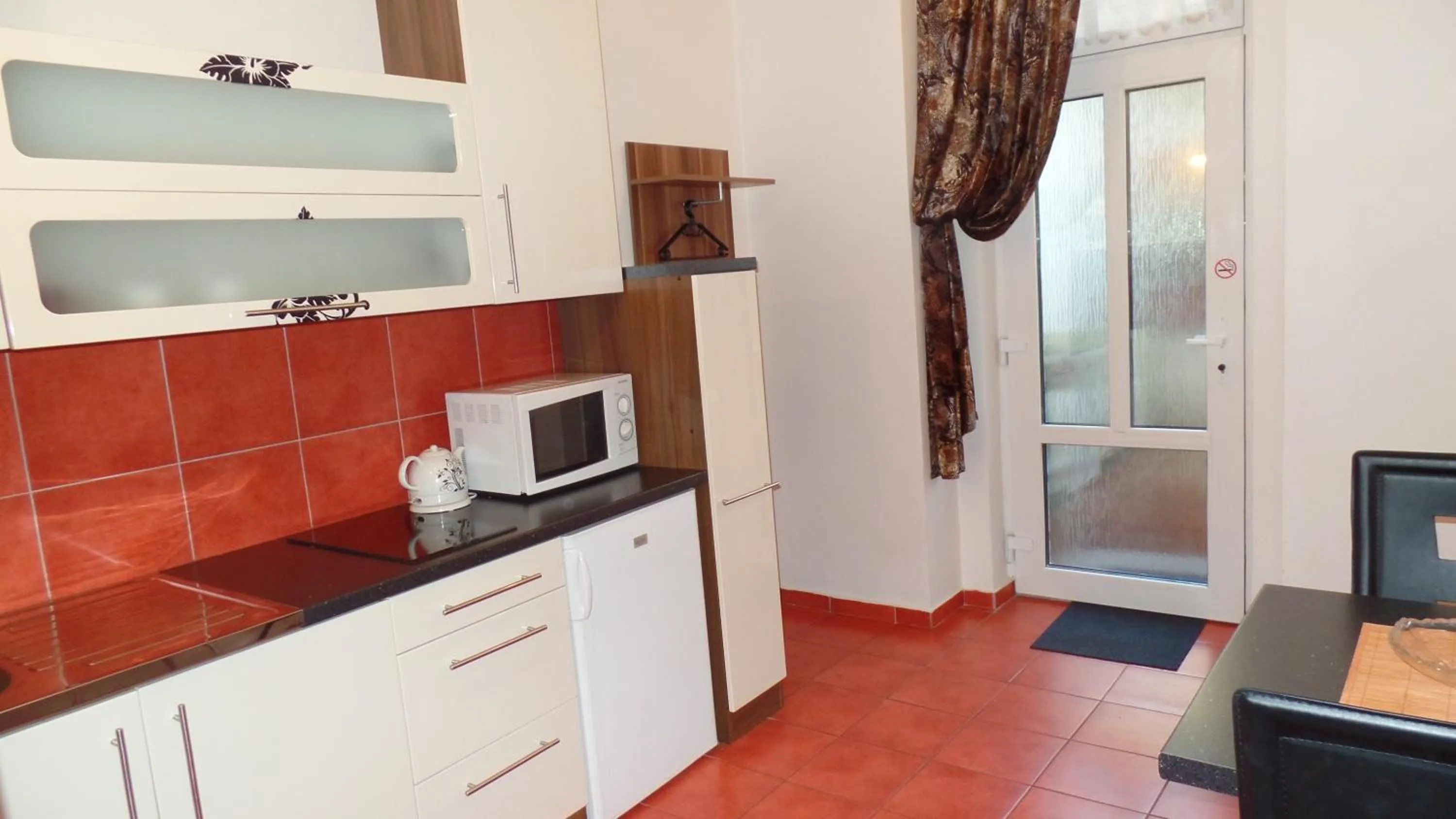 Kitchen or kitchenette in Apartments Rokytka - Praha