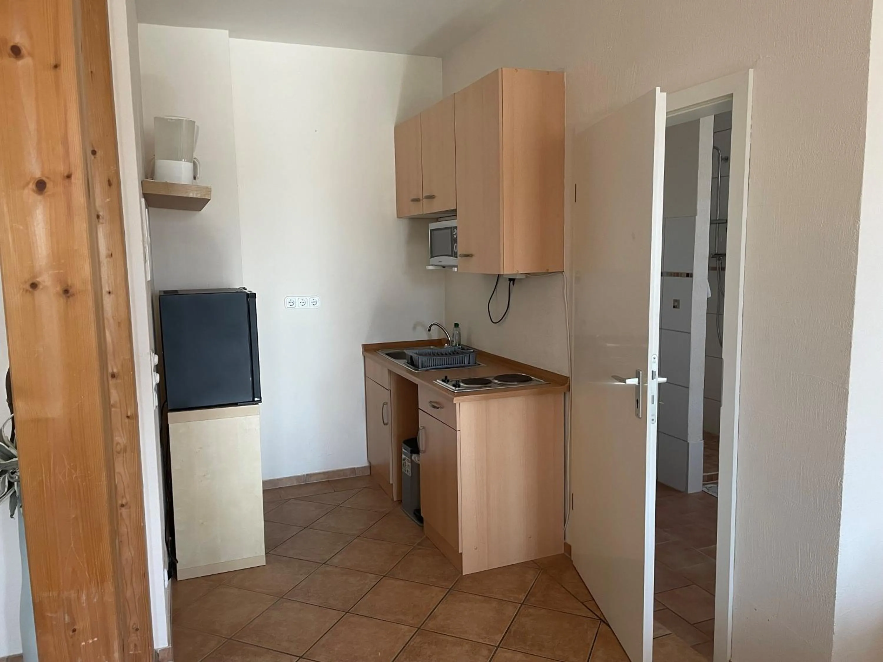 Kitchen or kitchenette in Hotel Corsten