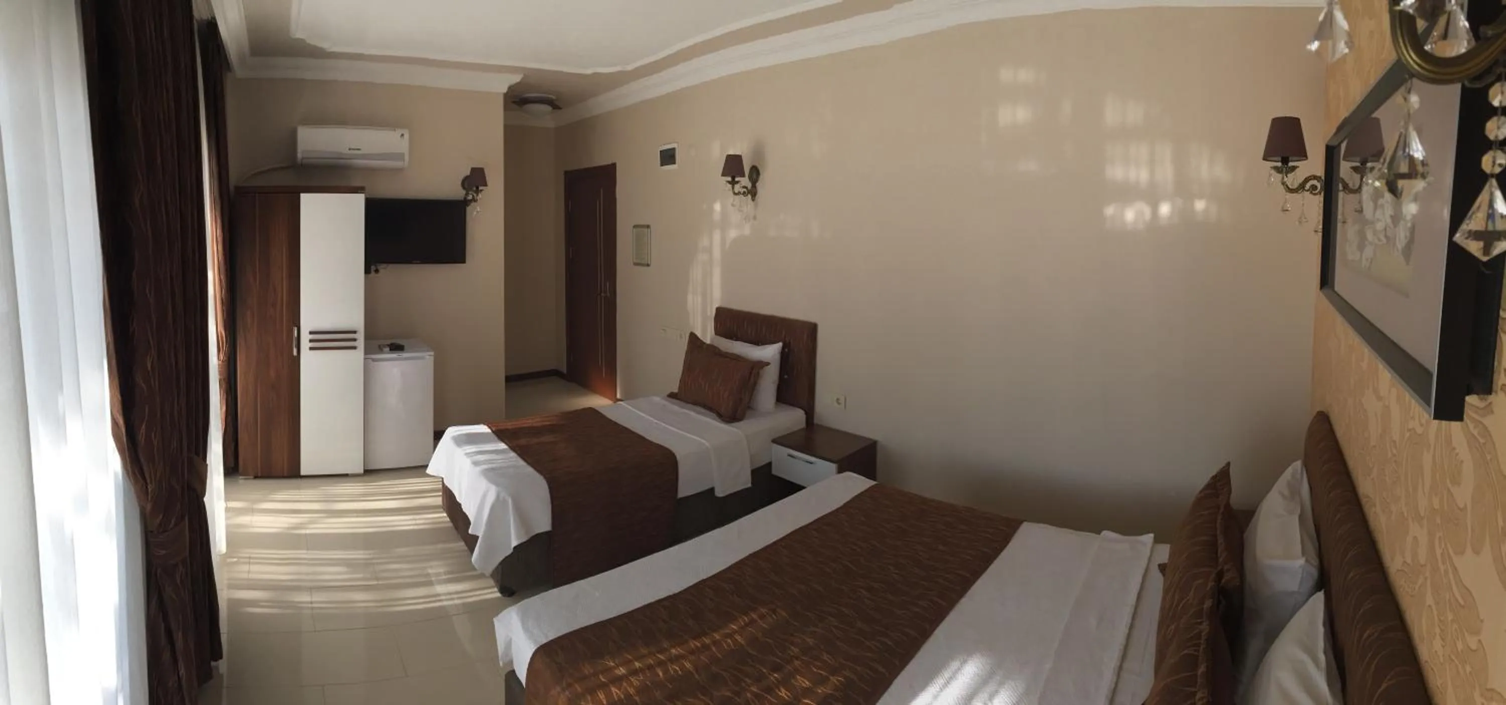Bed in Geyi̇kli̇ Sunshi̇ne Hotel