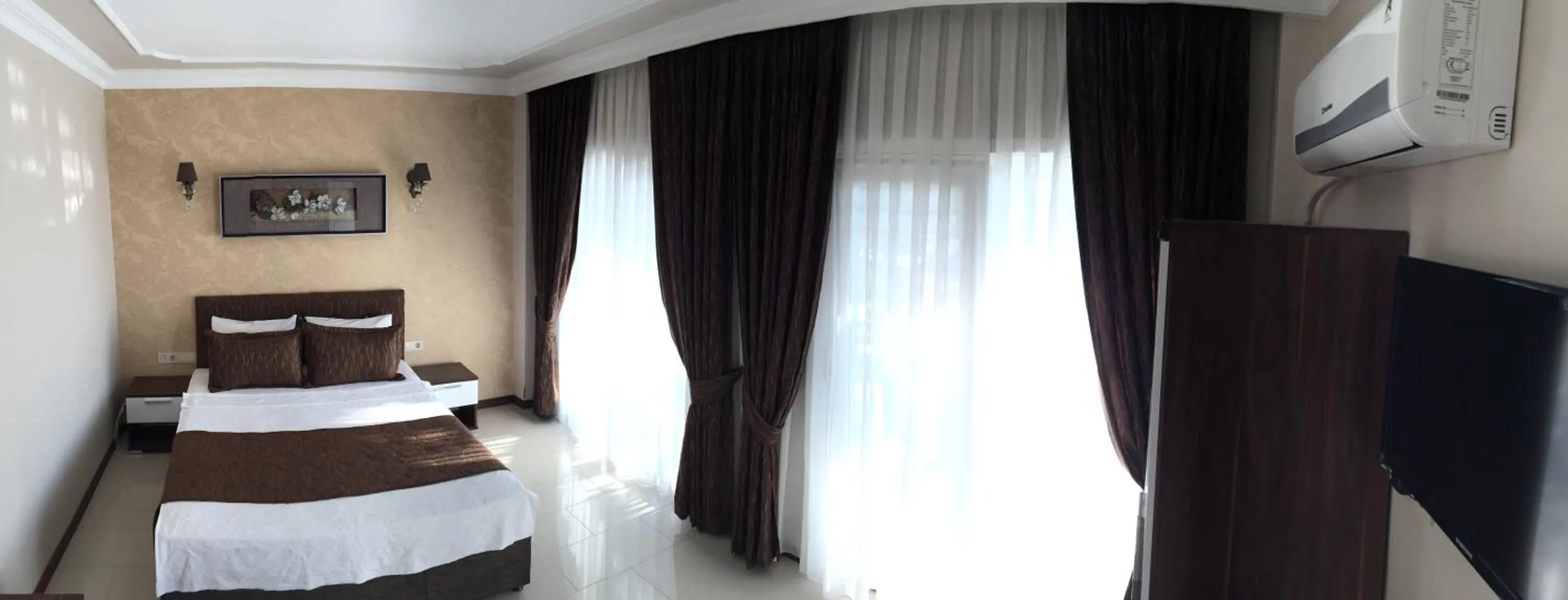 Bed in Geyi̇kli̇ Sunshi̇ne Hotel