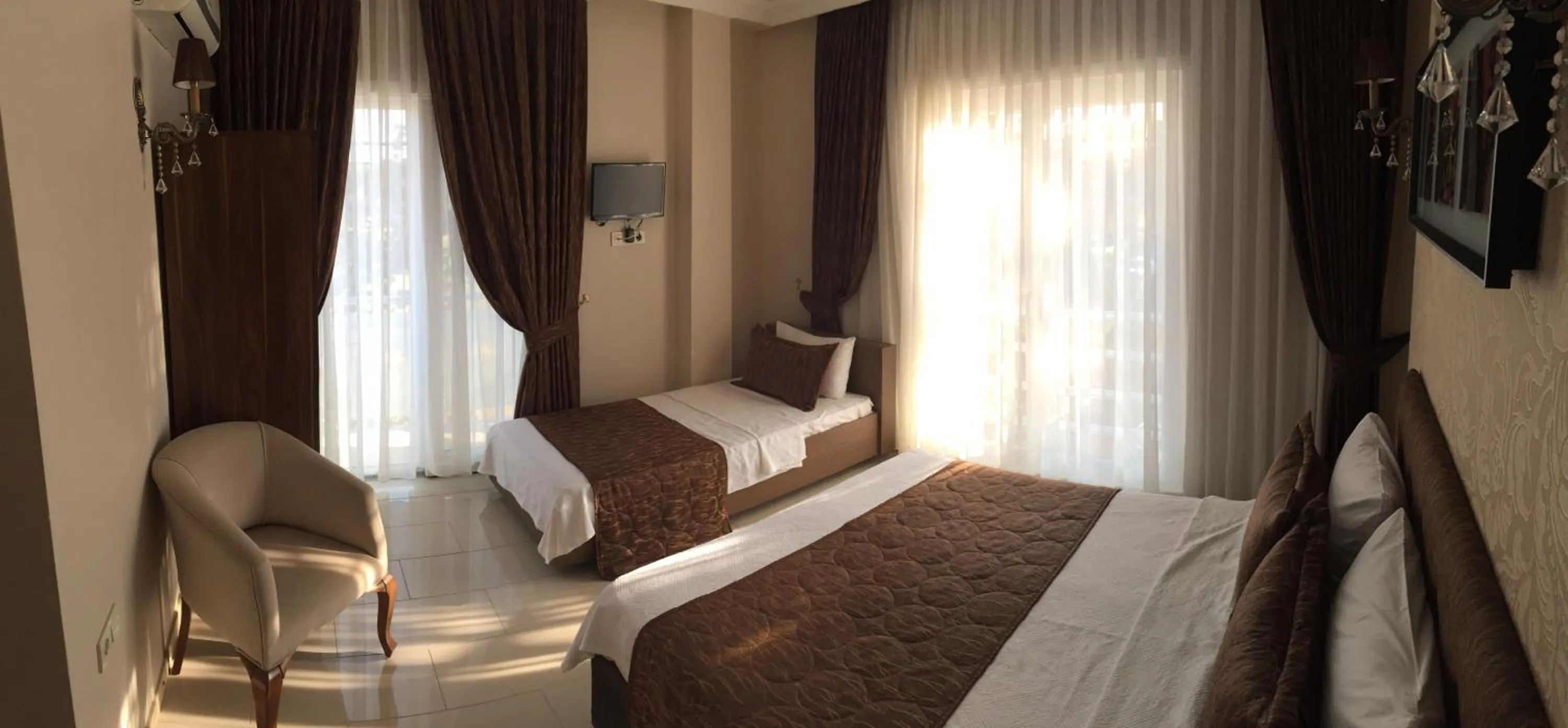 Bed in Geyi̇kli̇ Sunshi̇ne Hotel