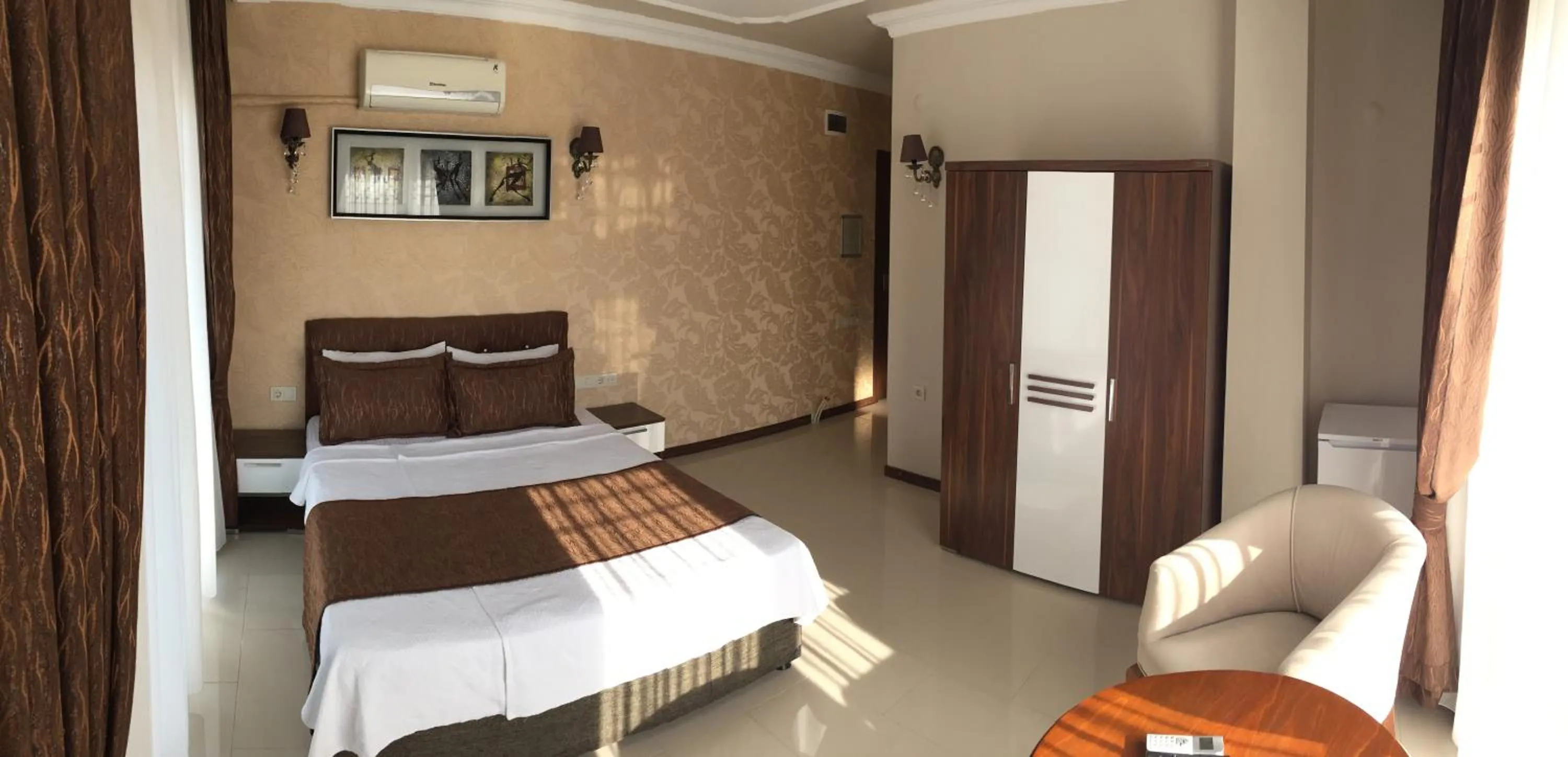 Bed in Geyi̇kli̇ Sunshi̇ne Hotel