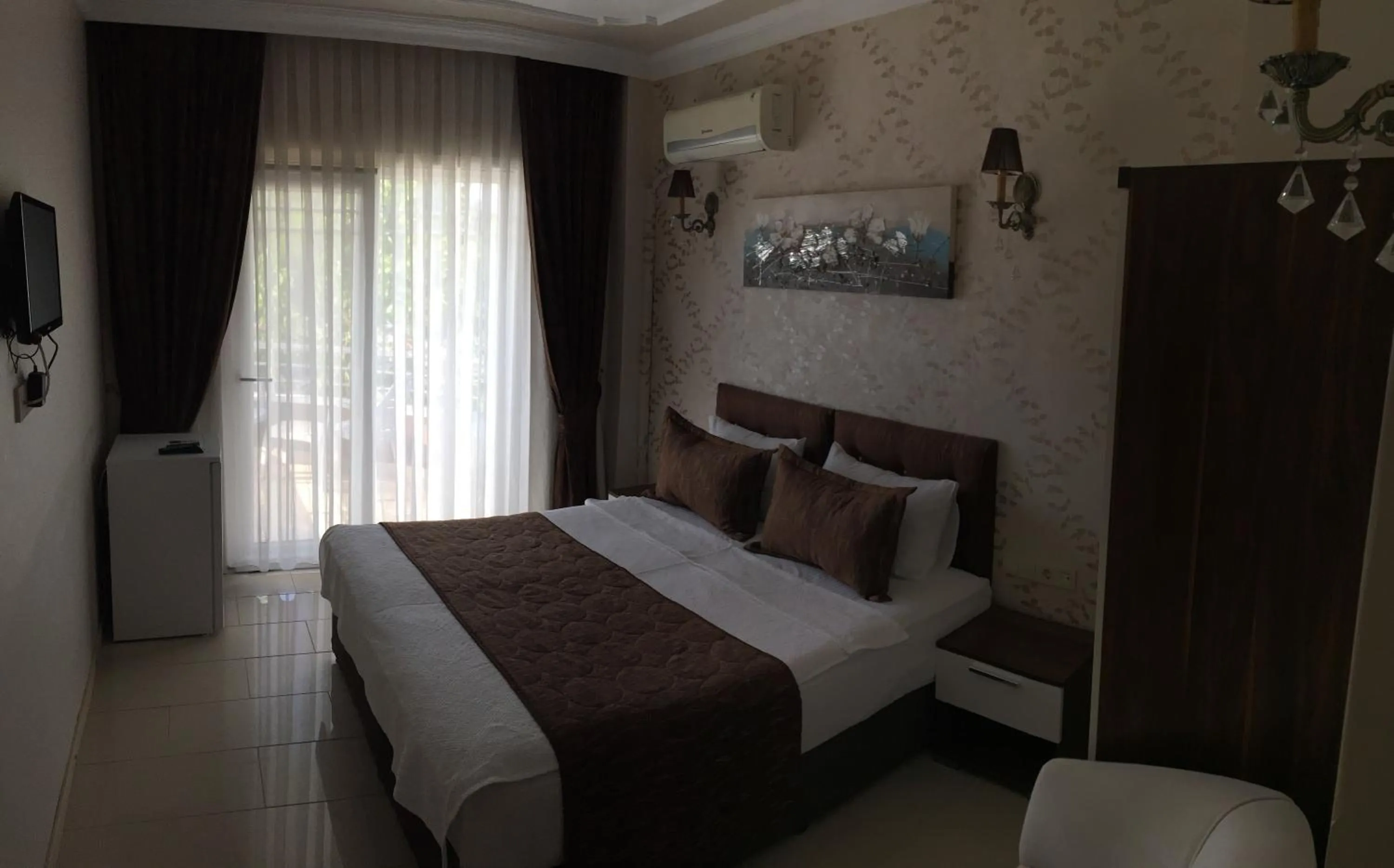 Bed in Geyi̇kli̇ Sunshi̇ne Hotel