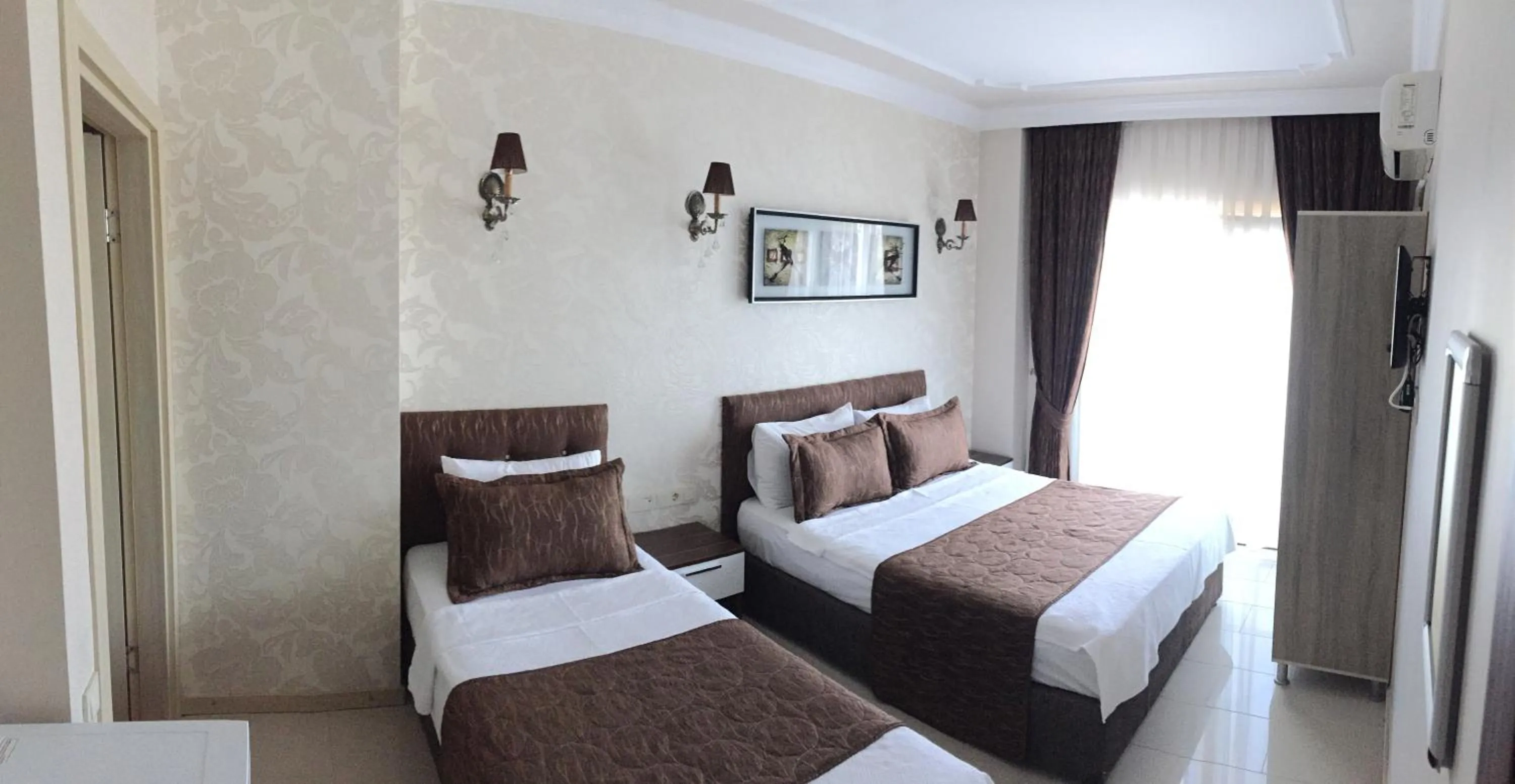 Bed in Geyi̇kli̇ Sunshi̇ne Hotel