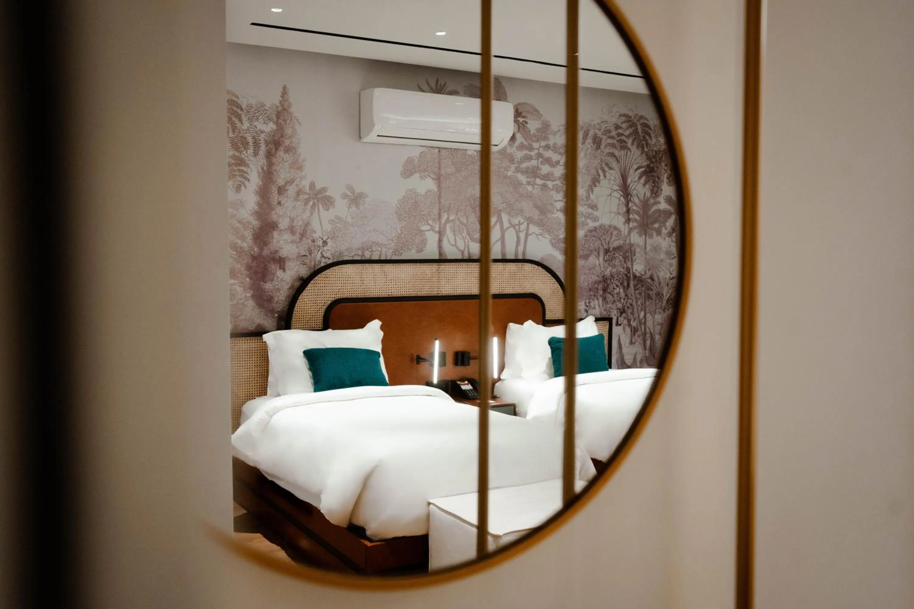 Bed in Ambiance Boutique Art Hotel Islamabad