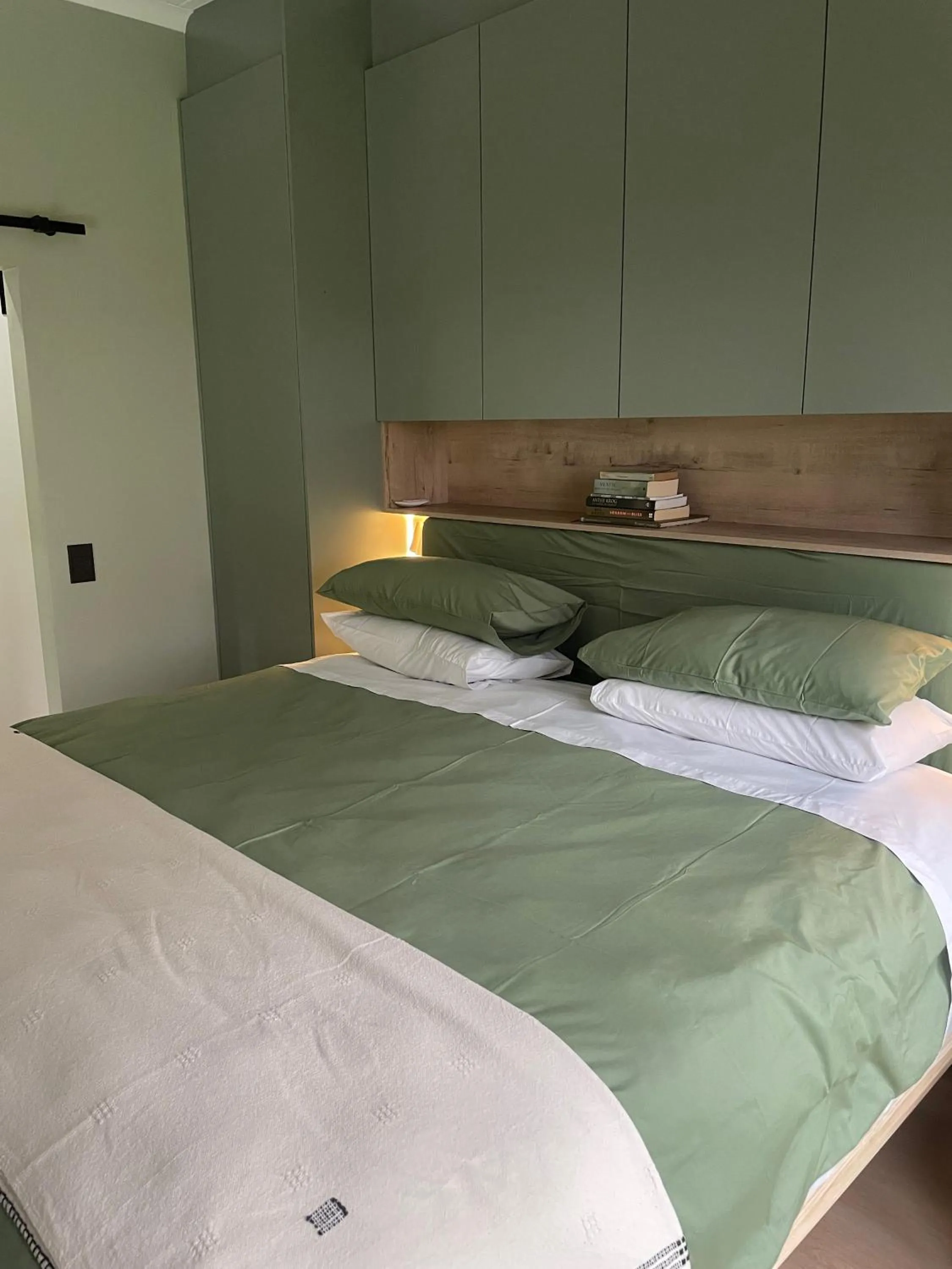 Bed in InAweStays Holiday Homes