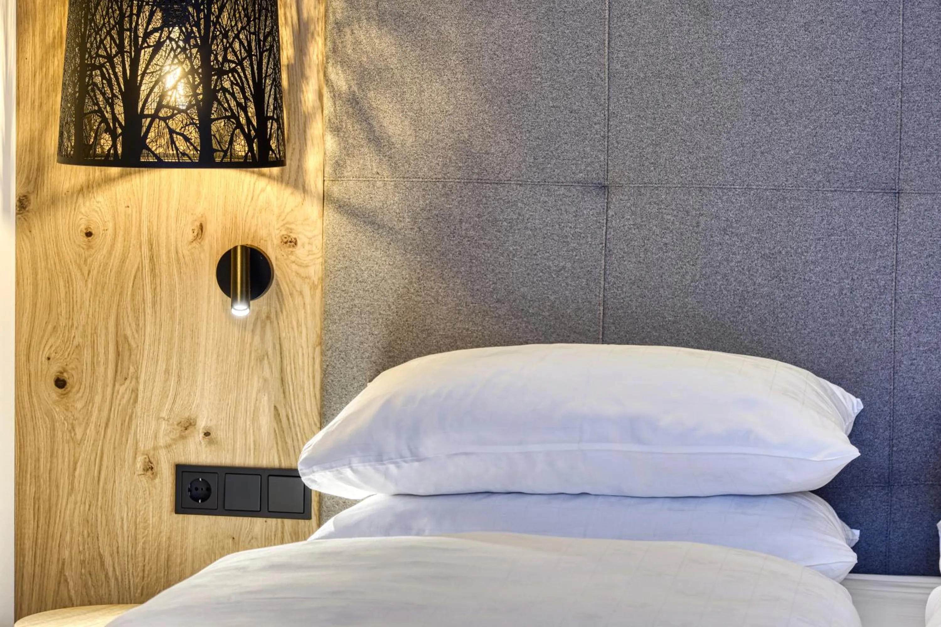 Bed in Brunelle Seiser Alm Lodge