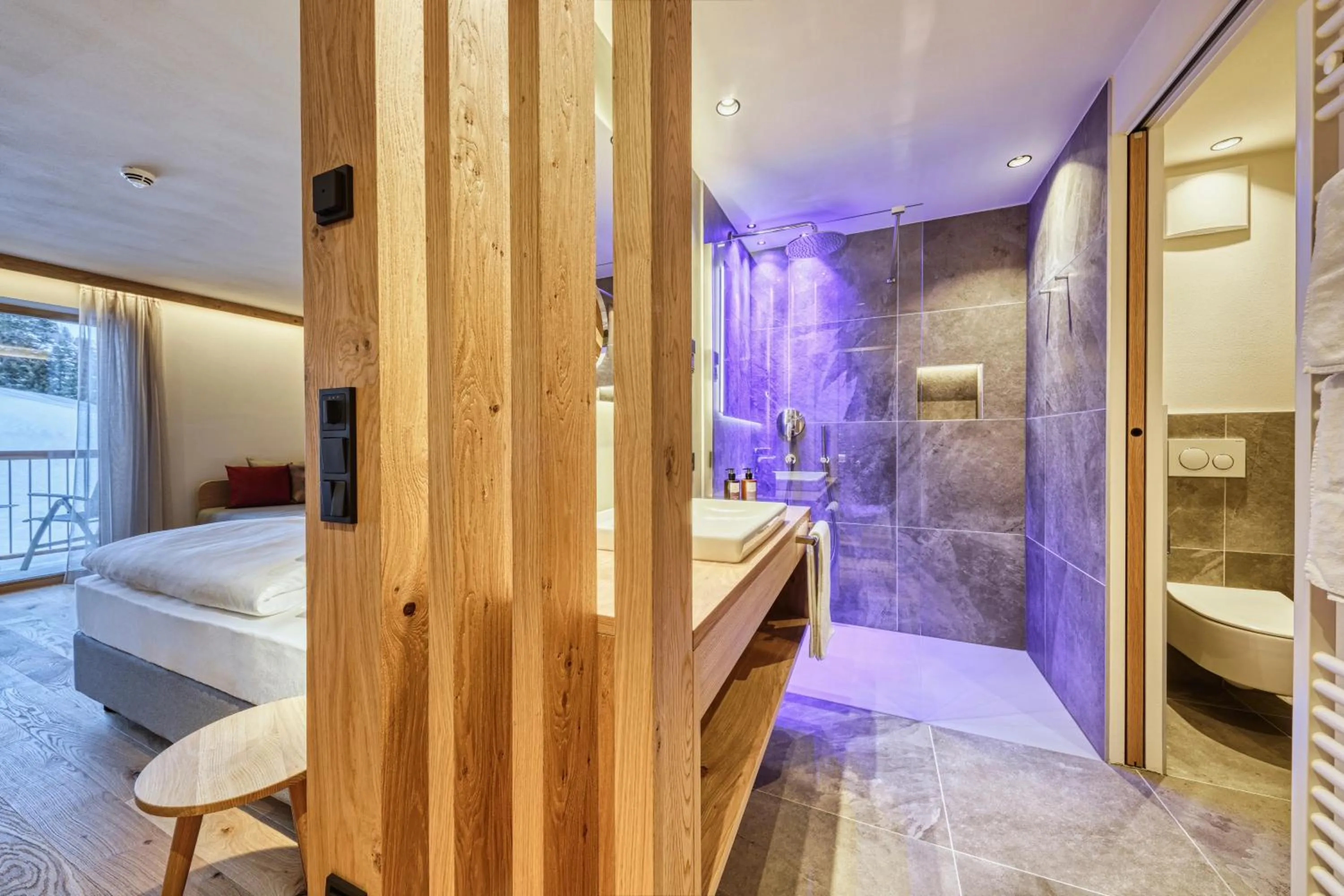 Bathroom, Bed in Brunelle Seiser Alm Lodge